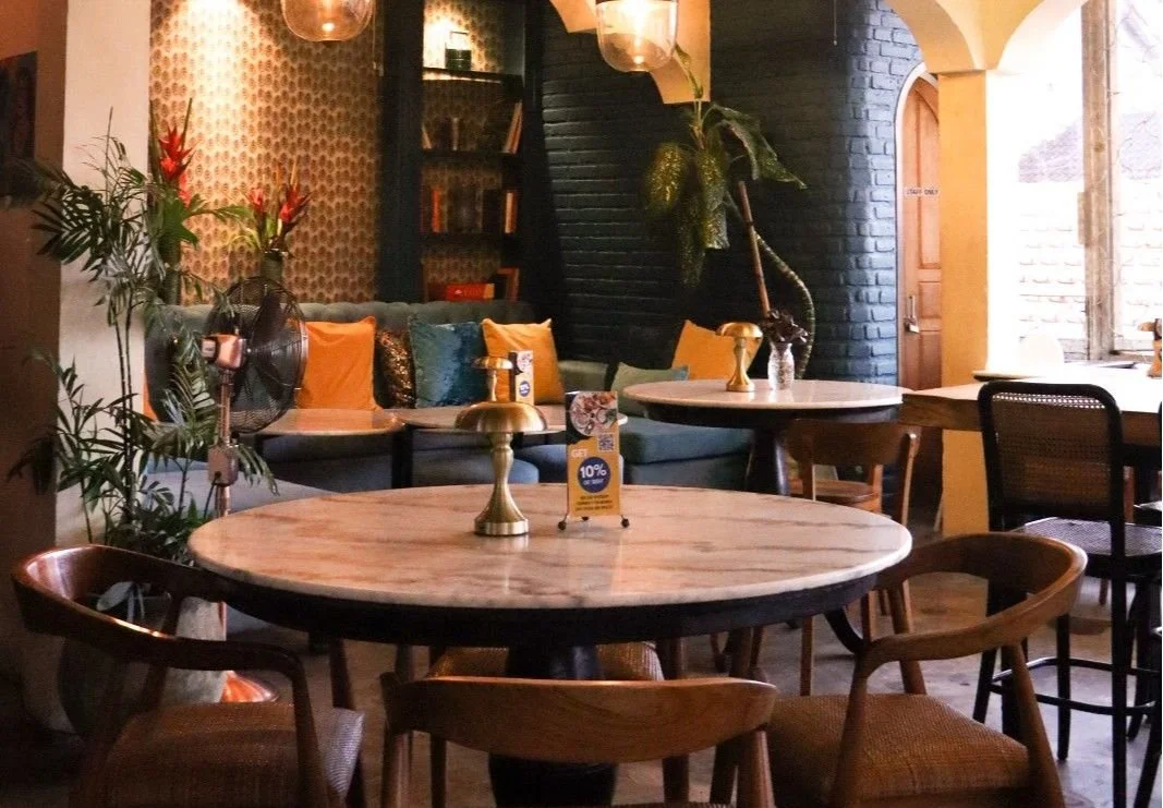 Warm and comfortable dining area at Pesona Lounge, an Indian restaurant and cocktail bar on Jalan Goutama in Ubud.