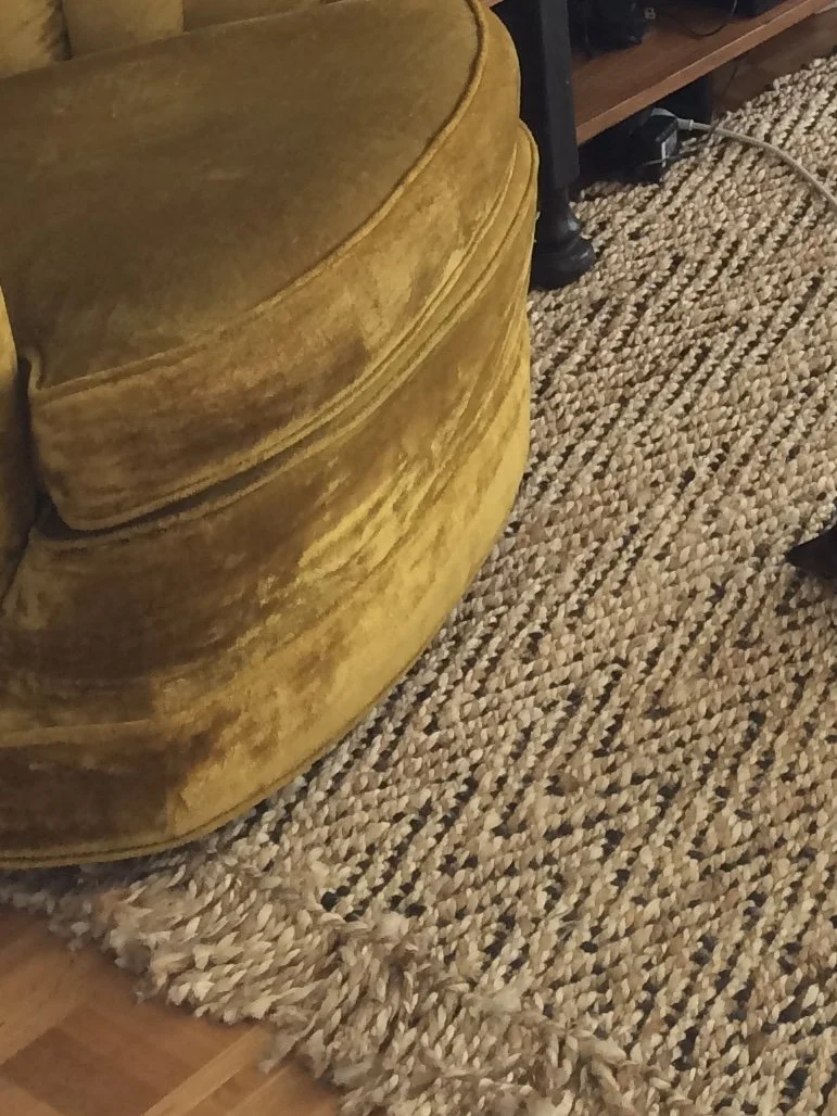 the wooden swivel is underneath, fully assembled, you can not see it, chair appears to float on a swivel. 