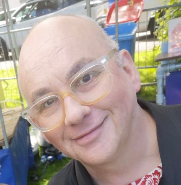 A Photograph of Coach Cam Winton