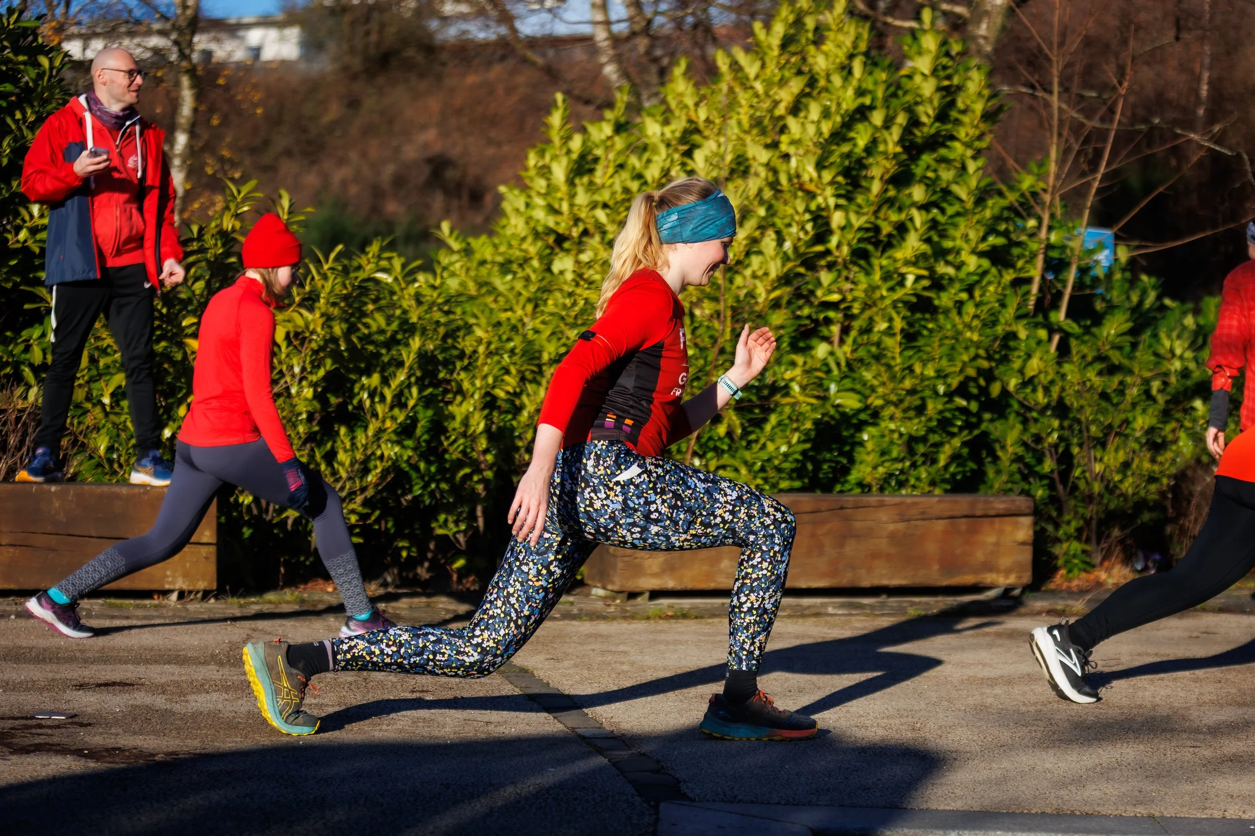 A GFR member lunging as part of the fun run
