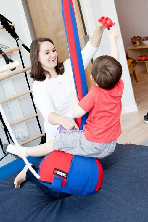 Kid+at+OT+on+Swing.jpg
