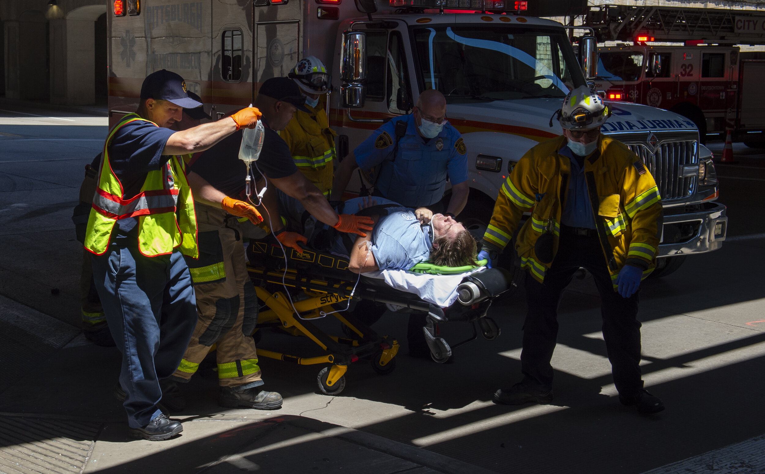  A driver is moved on a stretcher after an accident between a Chevy truck and an AHN (Allegheny Health Network) Allegheny General Employee Shuttle on Federal Street on June 24, 2021, in Pittsburgh, Pa. 