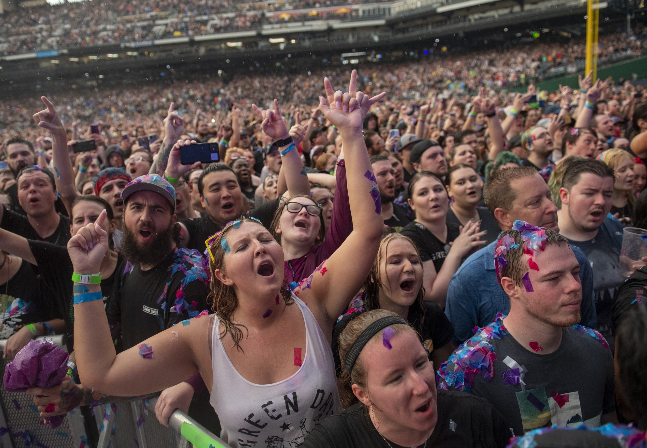  Fans cheer for Fall Out Boy as they perform on August 19, 2021, in the PNC Park, in Pittsburgh, Pa.  