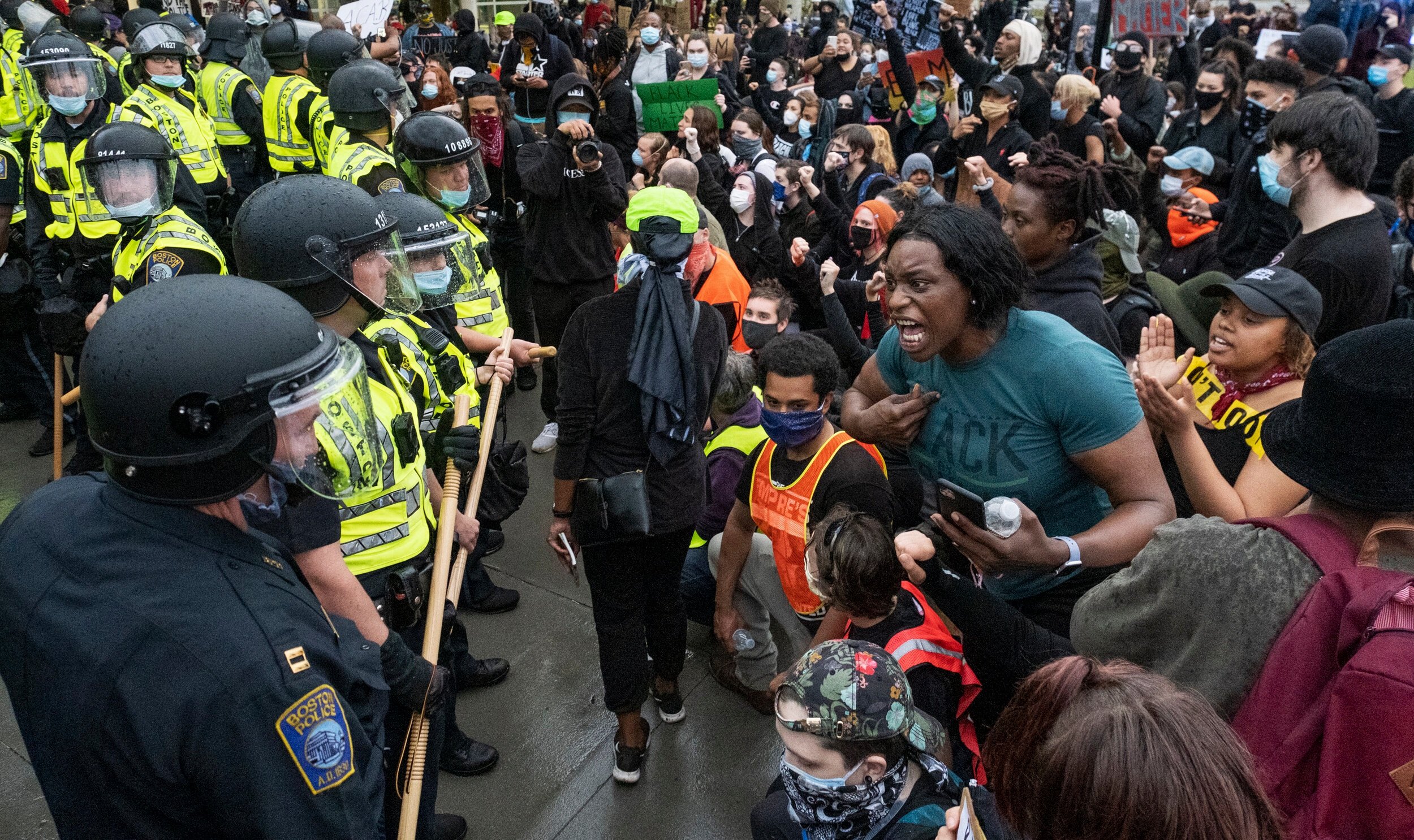  Protesters surround Boston police officers at the Forest Hills train station in Boston, Massachusetts, on June 2, 2020. 