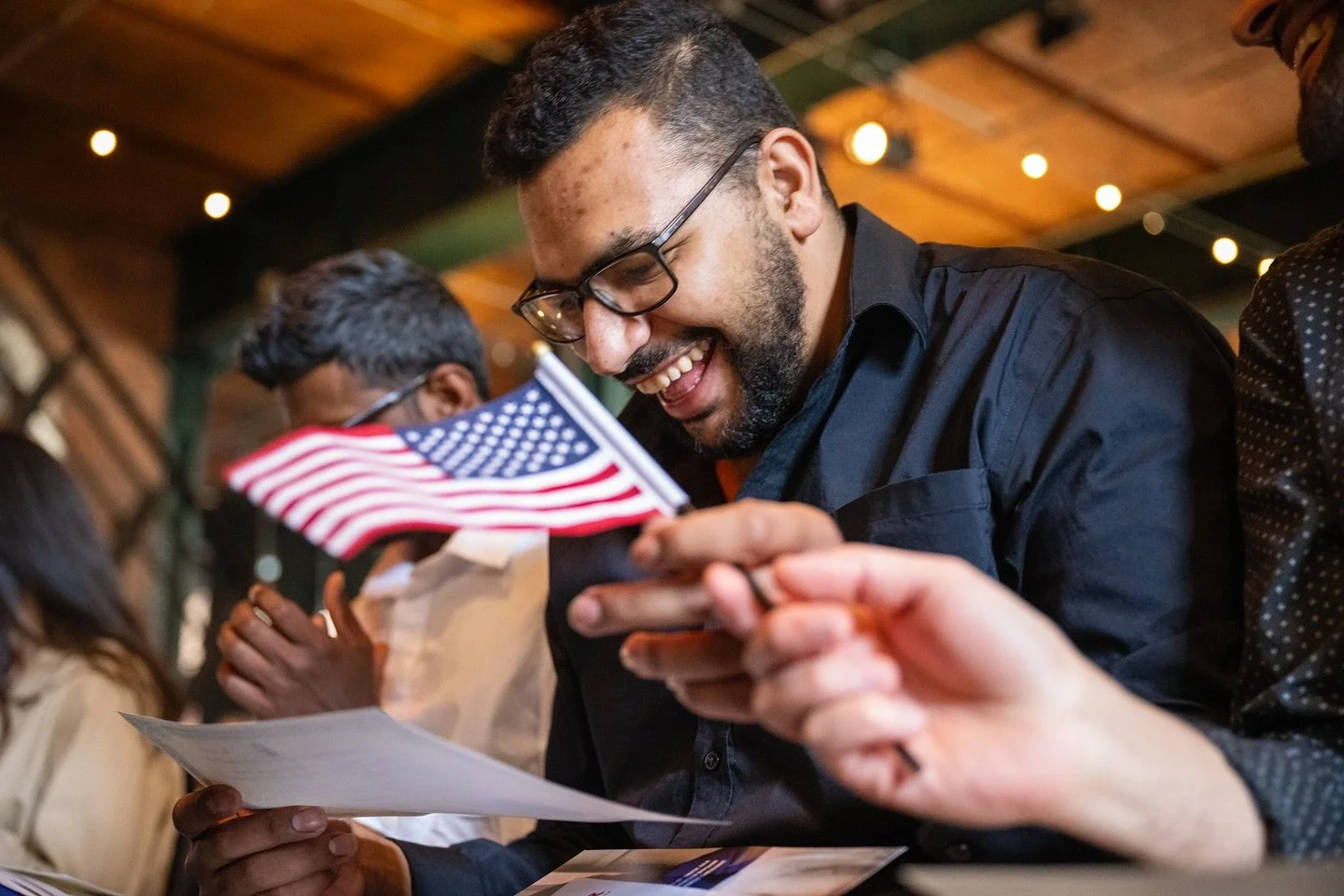 When Harsh Vachani came to the U.S. more than five years ago, had a goal: to become a citizen.
Born in India, his dream was realized Thursday as he was officially naturalized alongside 47 others in a ceremony held at the Heinz History Center in the S