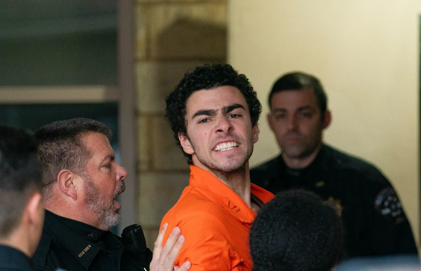 26-year-old Luigi Mangione is taken into the Blair County Courthouse on Tuesday, Dec. 10, 2024, in Hollidaysburg. Mangione is believed to have been carrying a firearm similar to the one used in the murder of UnitedHealthcare CEO Brian Thompson. He ye
