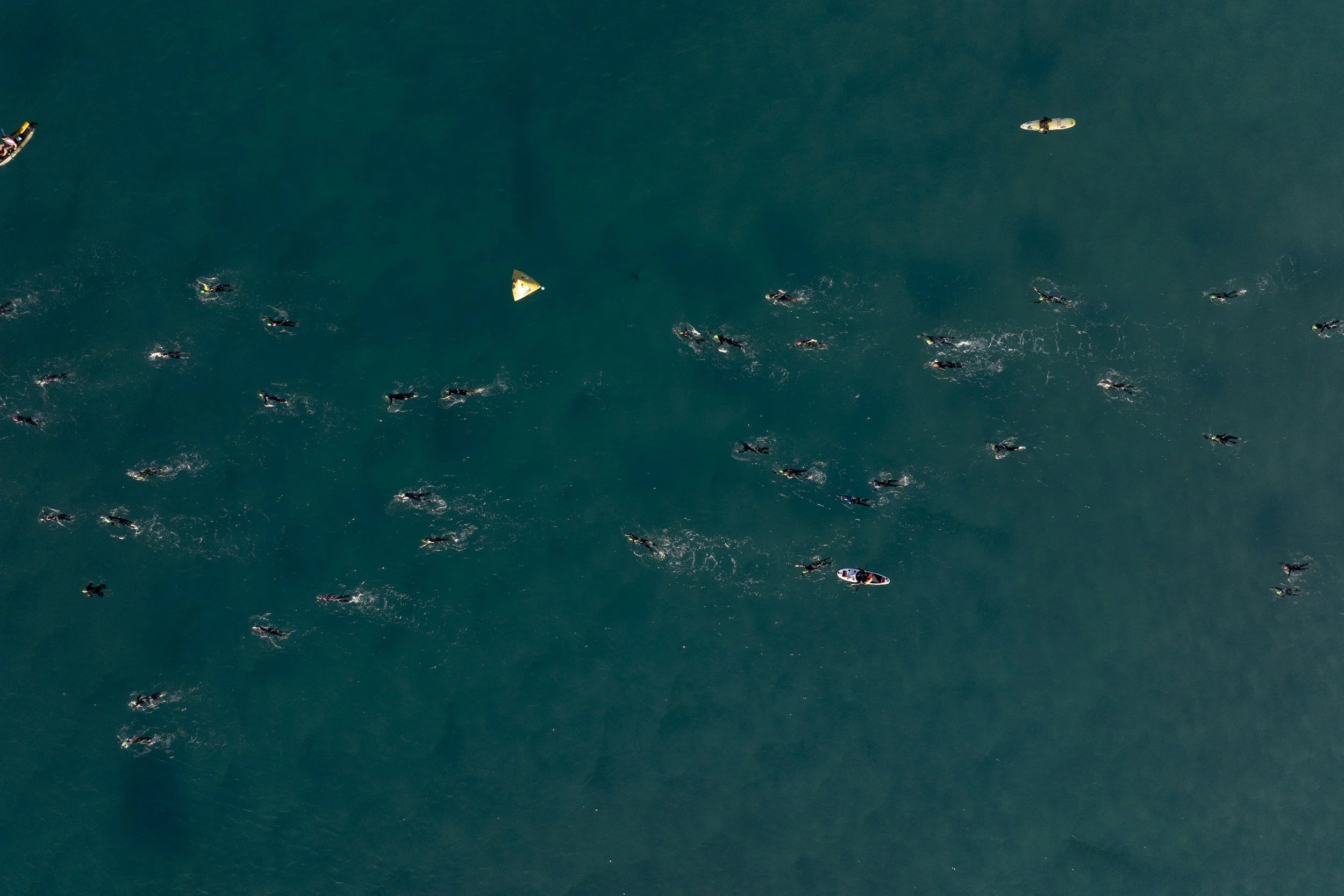  Age group athletes competes in the swim course of the 2025 IRONMAN Florida on November 1, 2025 in Panama City Beach, Florida. (Photo by Benjamin B. Braun/Getty Images for IRONMAN) 