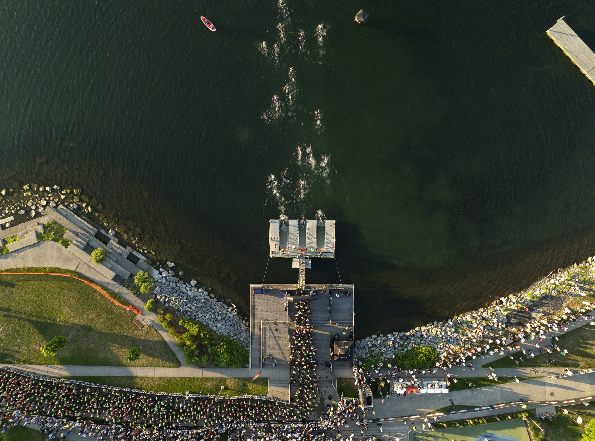  Age-group athletes start the swim portion of IRONMAN 70.3 Musselman on July 12, 2026 in Geneva, New York. (Photo by Benjamin B. Braun/Getty Images for IRONMAN) 