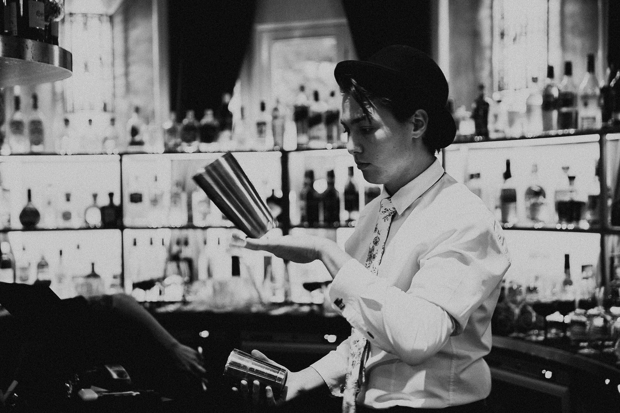Photo of a bartender making a cocktail at a private birthday party