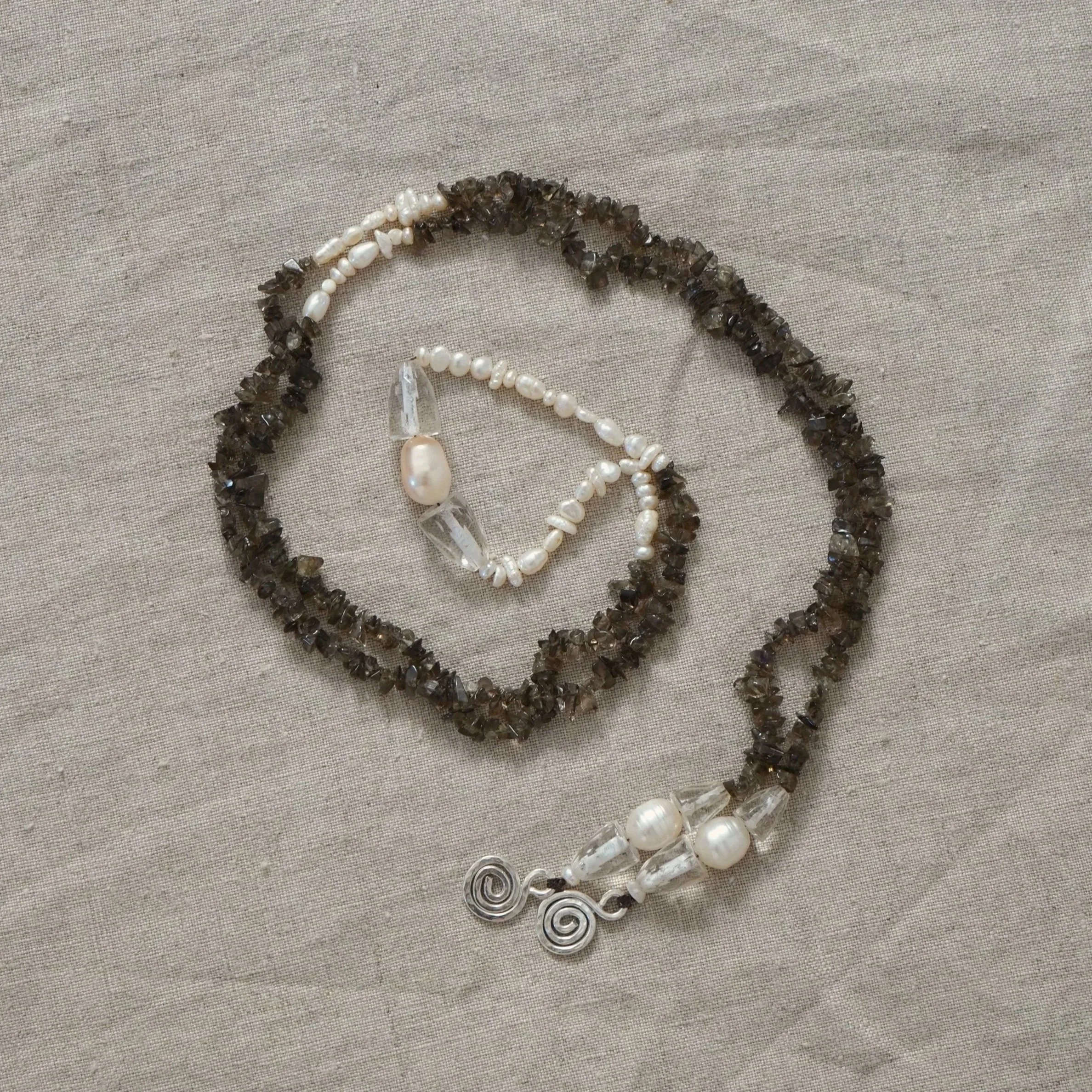 Long reclaimed pearl & smokey quartz pendant