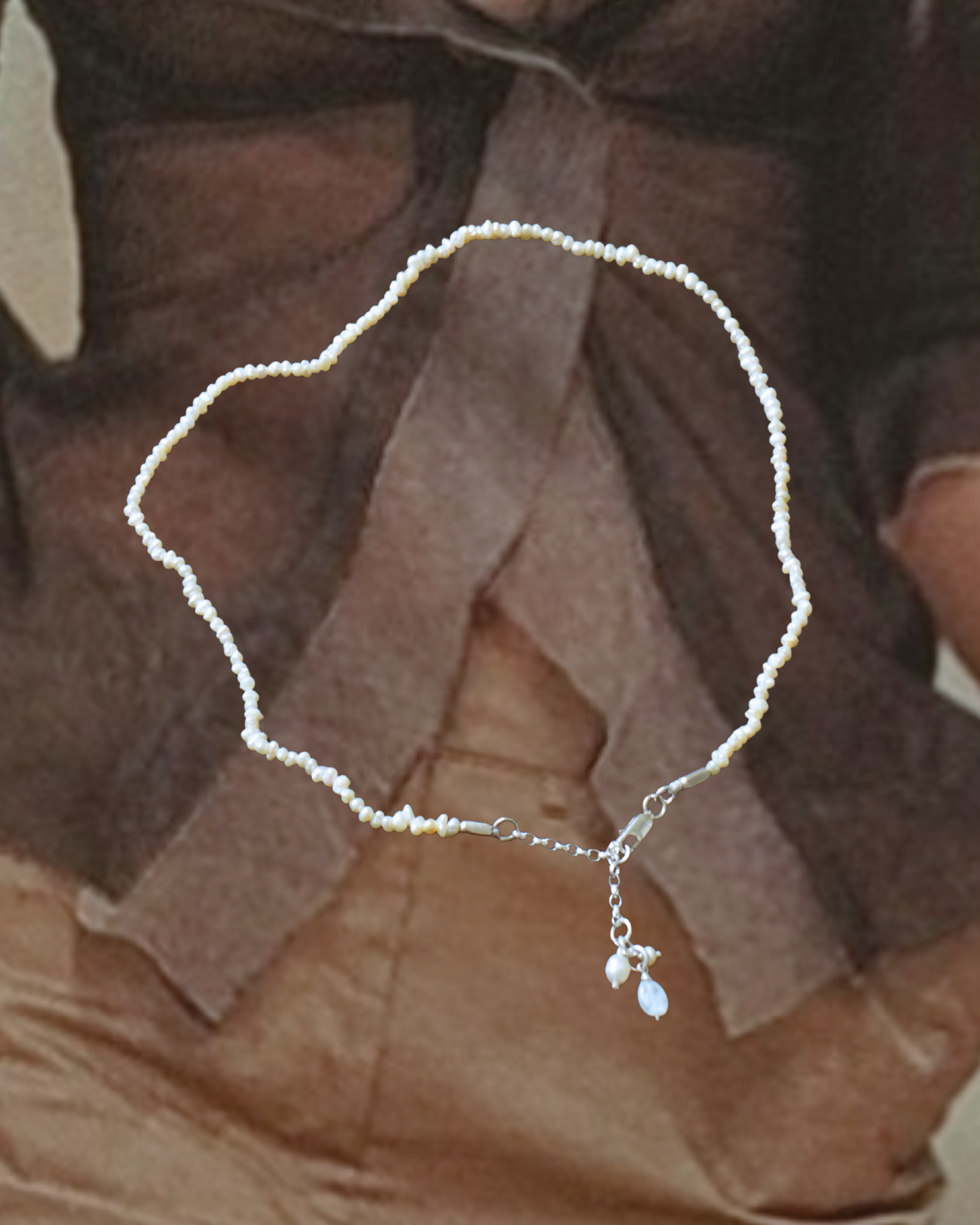 Reclaimed rice pearl necklace with silver chain & charms