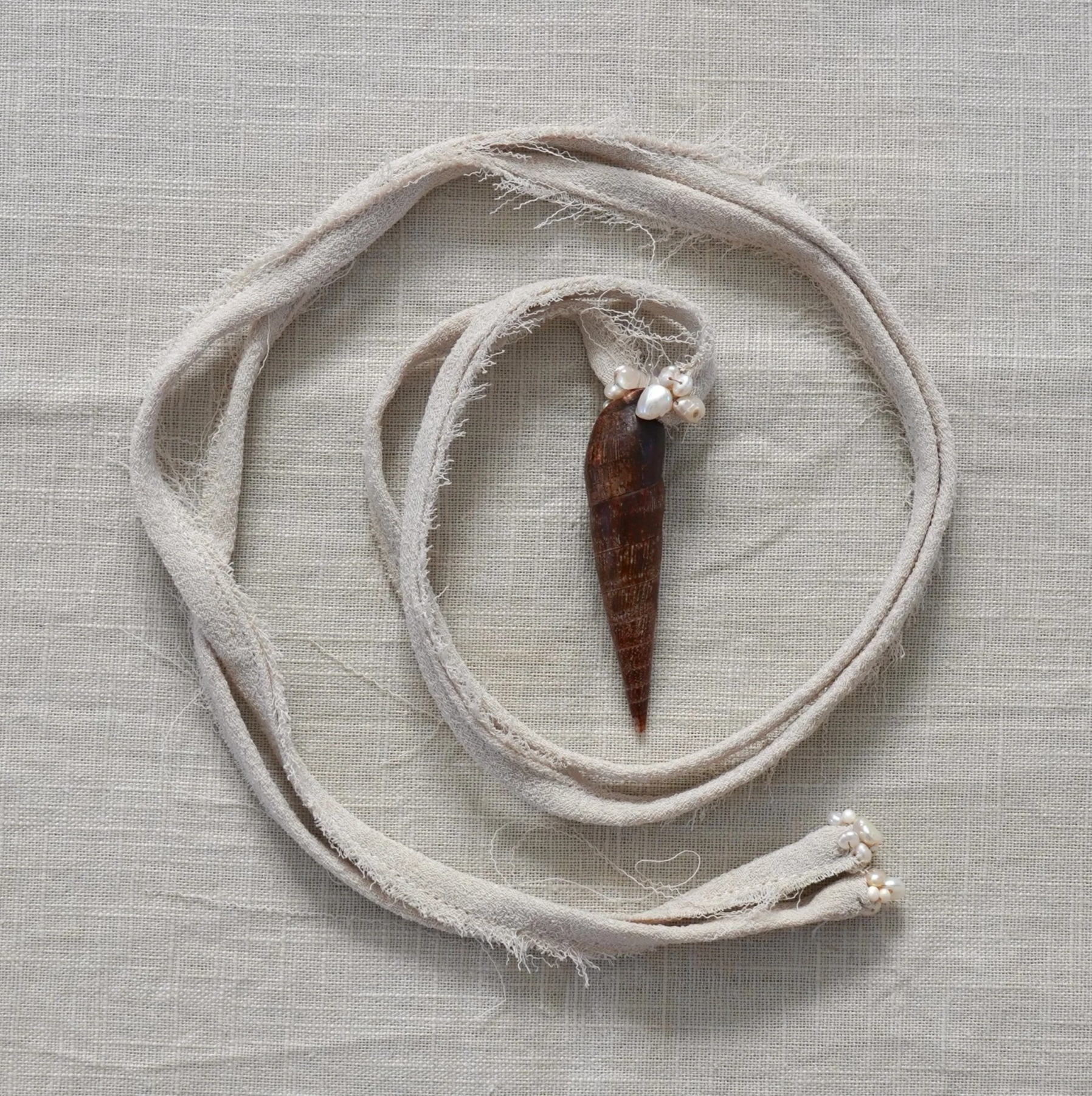 Large linnaeus shell & fabric necklace
