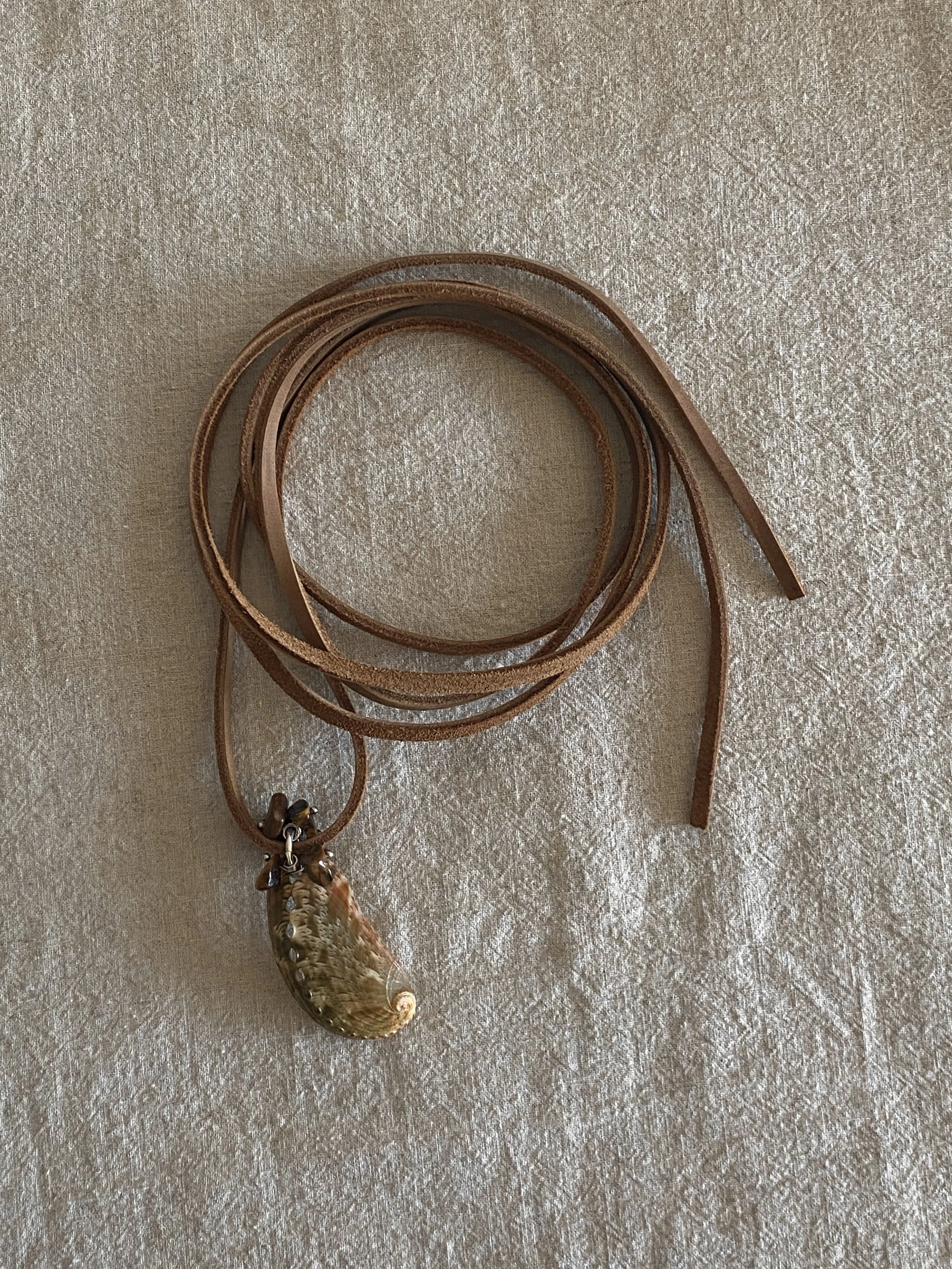 Abalone on suede cord