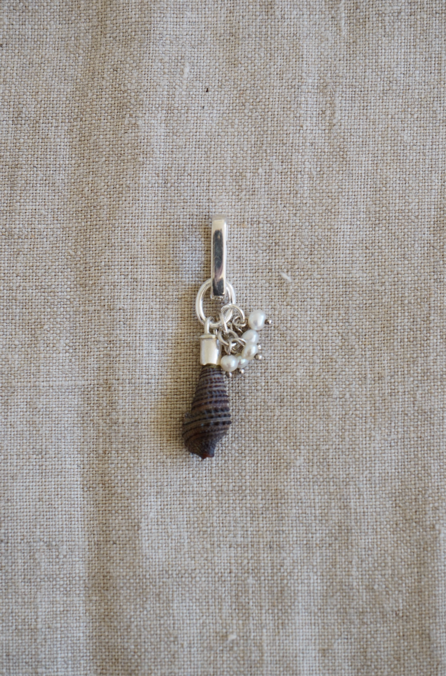 Shell trinket with tiny pearl cluster