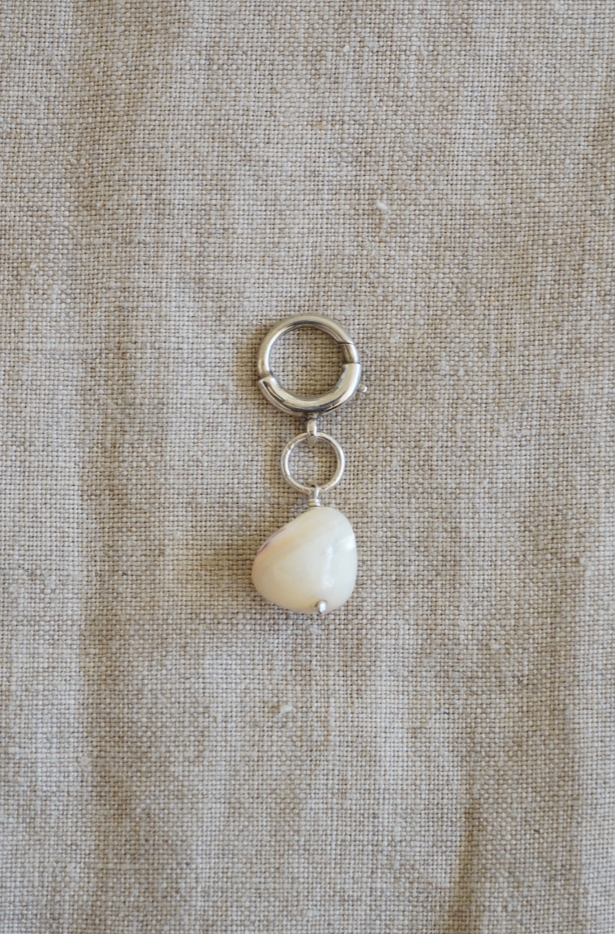 Mother of pearl trinket on chunky silver clasp