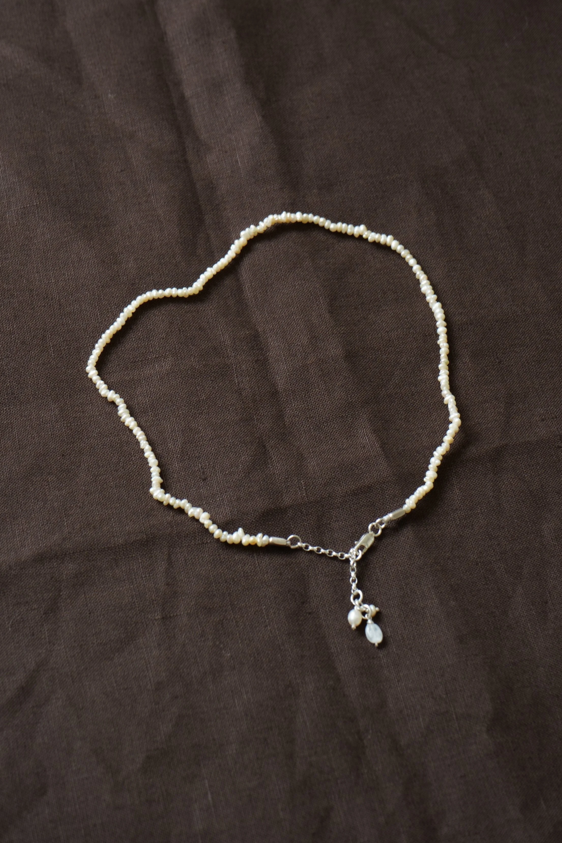 Reclaimed rice pearl necklace with silver chain & charms