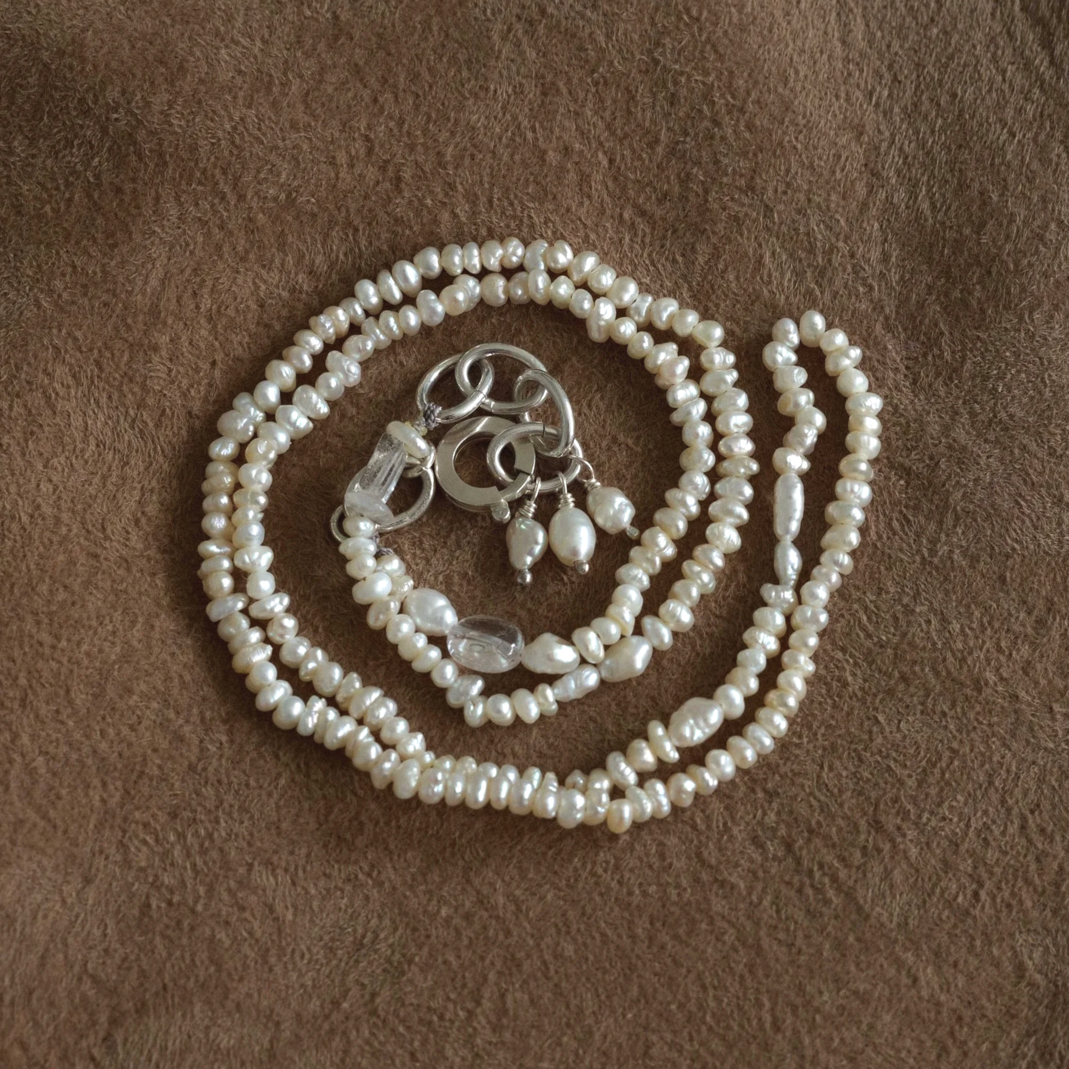 GATHERED pearl strand 01