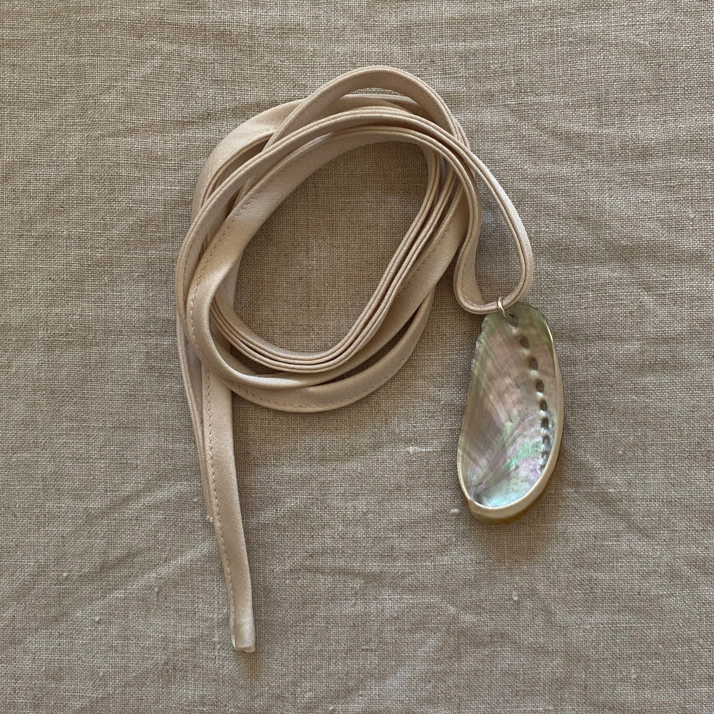 Abalone on satin remnant