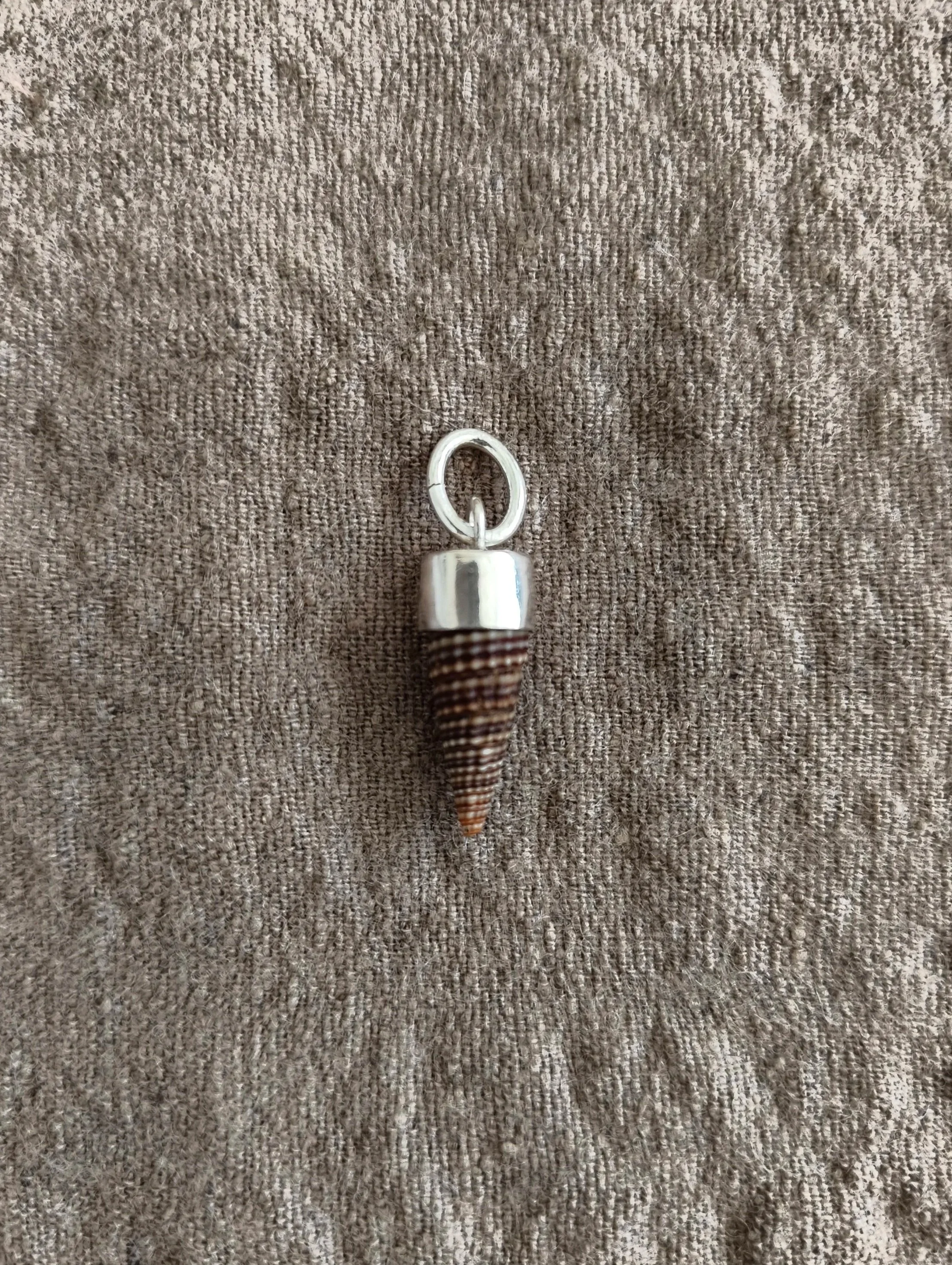 Brown pointy shell pendant
