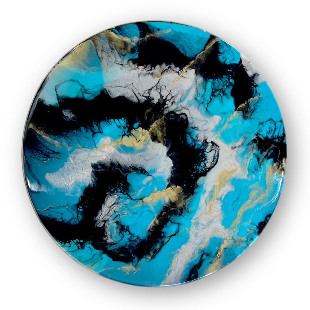 Abstract round art piece with swirling black, blue, white, and gold colors.