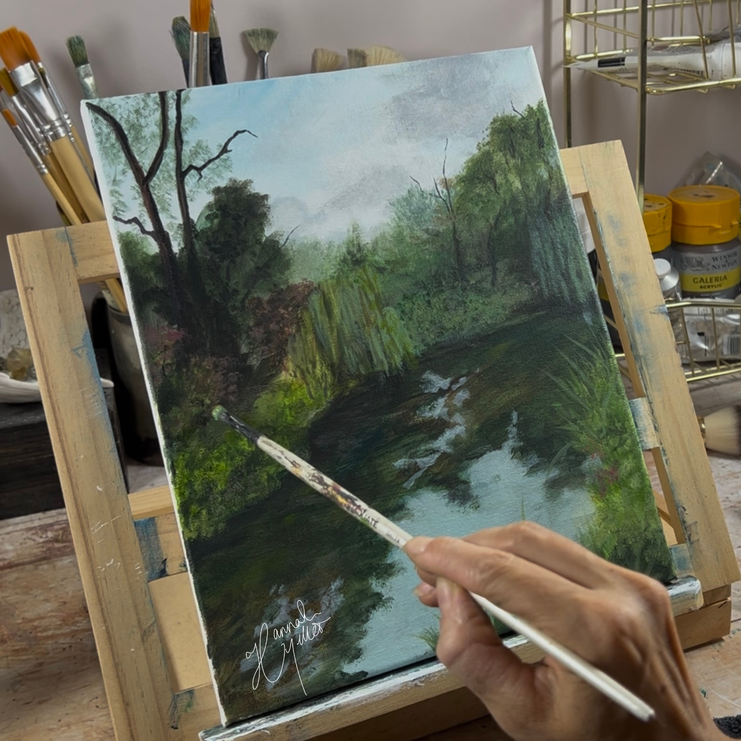 a hand painting on canvas a tranquil river scene