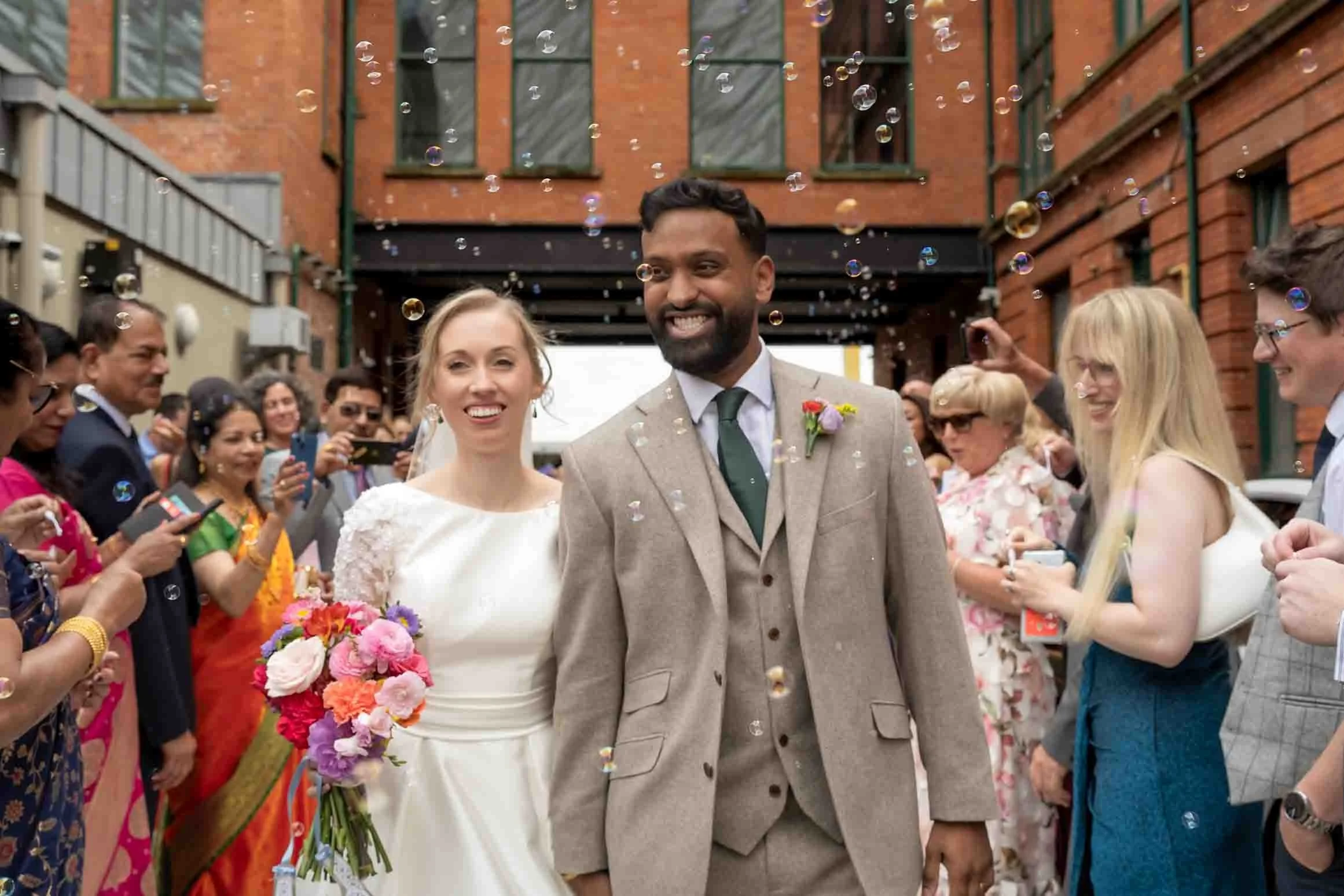 Bride and groom at Belfast Titanic Hotel wedding photographed in a natural documentary style
