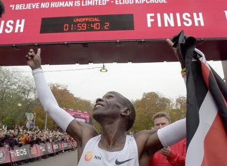 kenya's-eliud-kipchoge-celebrates-finish-line-after-440nw-10442738h.jpg