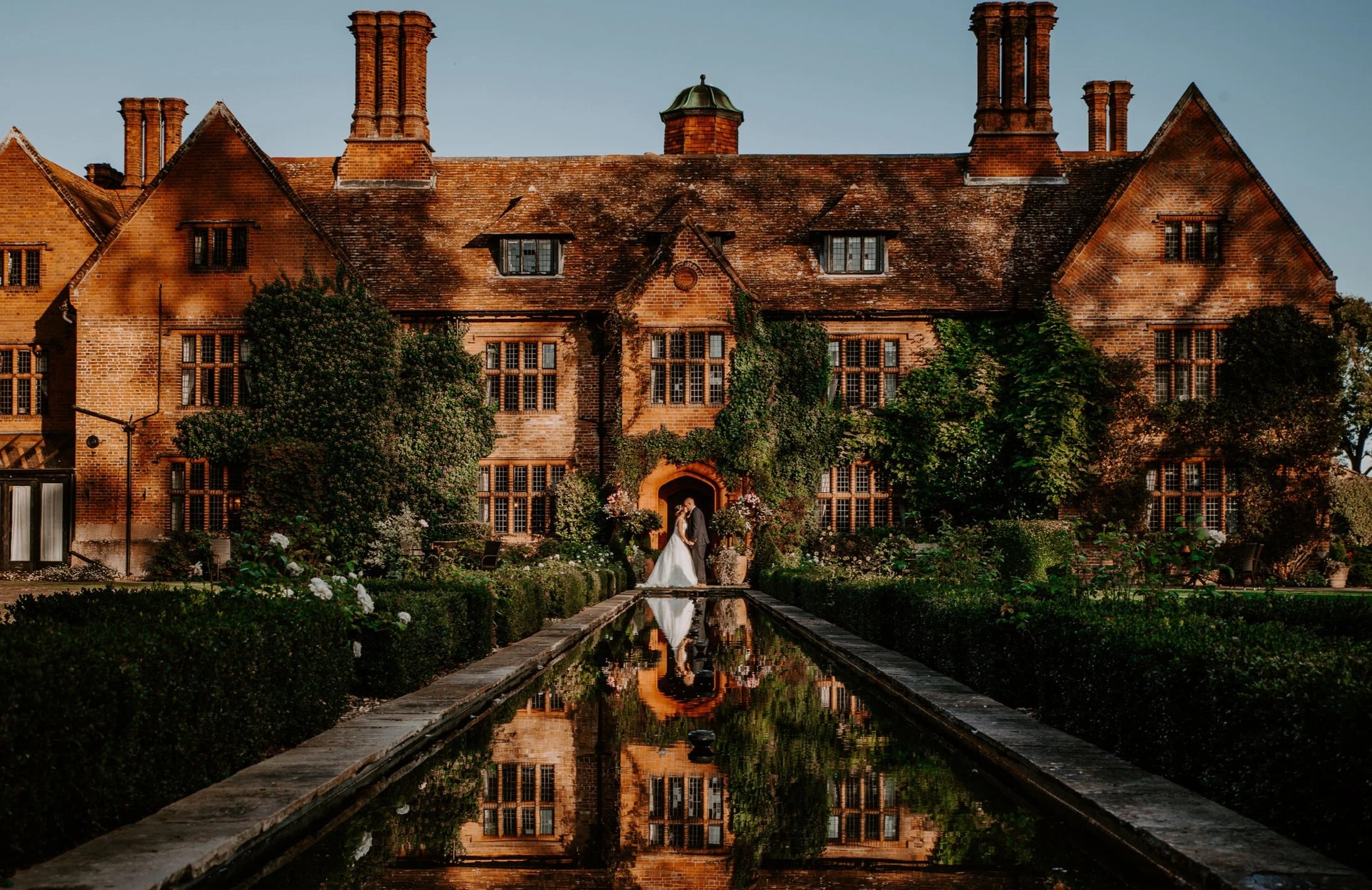 Wedding Day Editorial Sunset Portraits at Woodhall manor Photo by Photographer Liam Gillan 