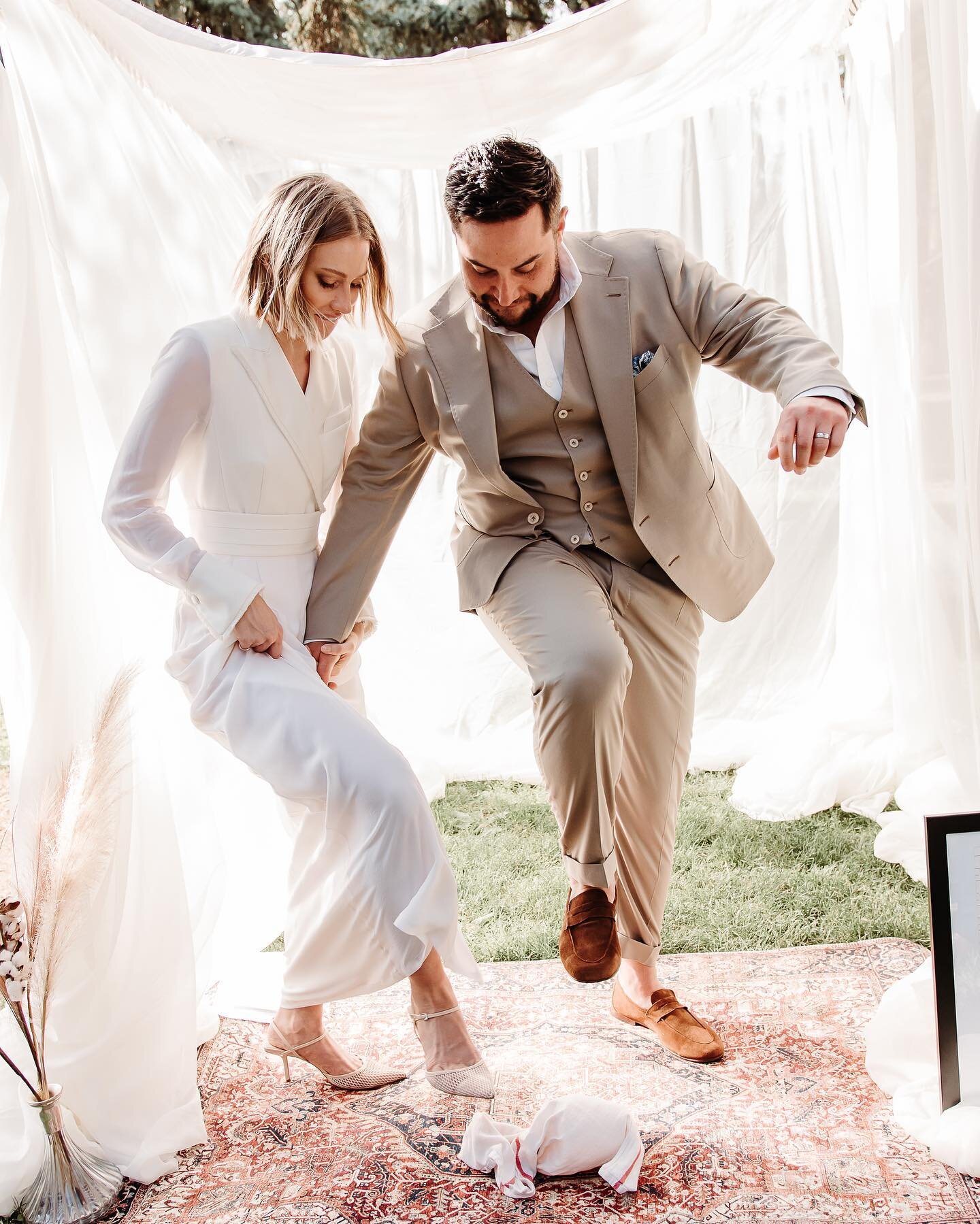 mazel tov ✨.

This is perhaps one of my favorite pictures from this day. I can still hear the glass break so crisply as these two love birds started their new adventure together 🤍.

📷: @angelaamenphotography 
.
.
.
#denverweddingplanners
#sandiegow