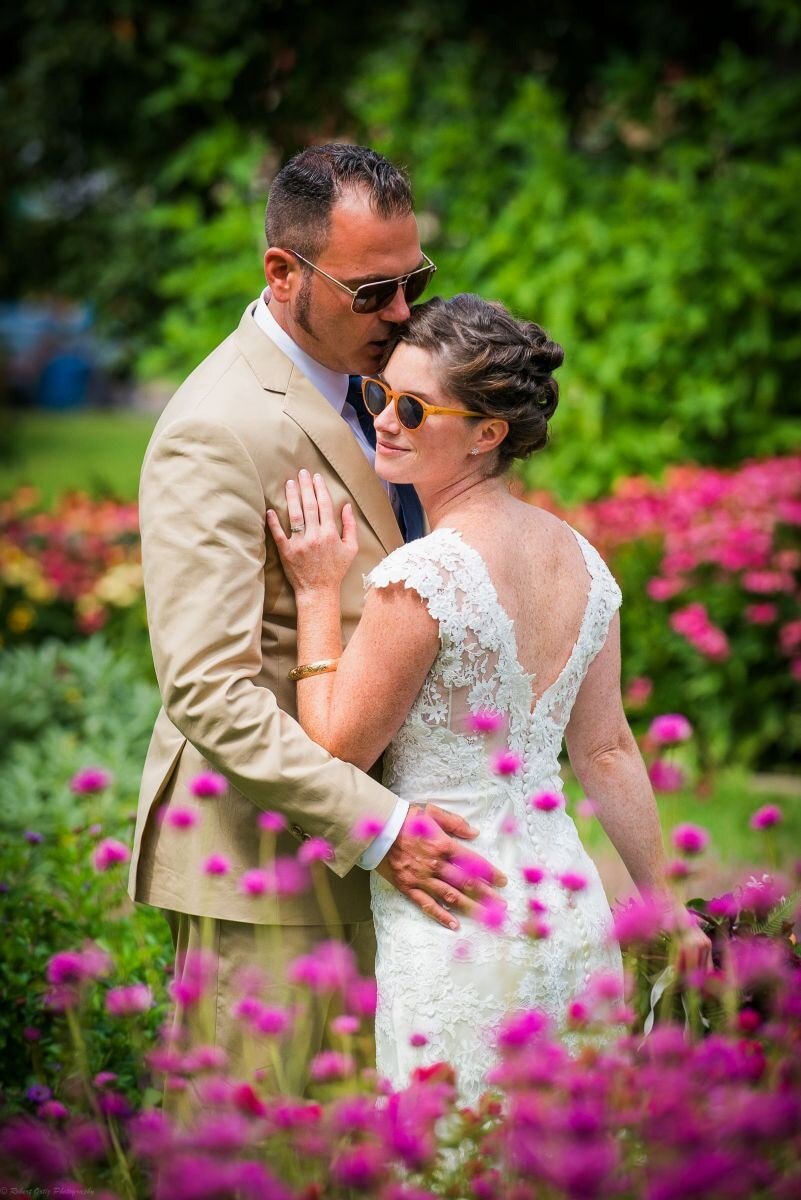 bride-and-groom-amongst-flowers-prescott-park.jpg