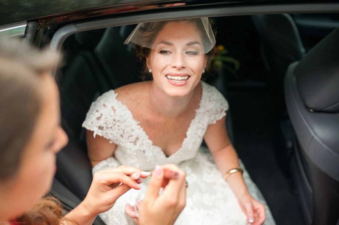 nh-wedding-bride-smiling-in-limo-portsmouth-nh.jpg