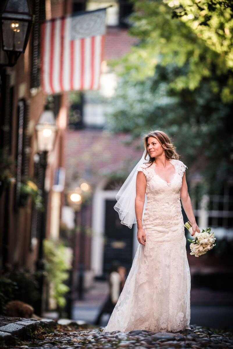 boston-acorn-street-bridal-portrait-with-flag.jpg