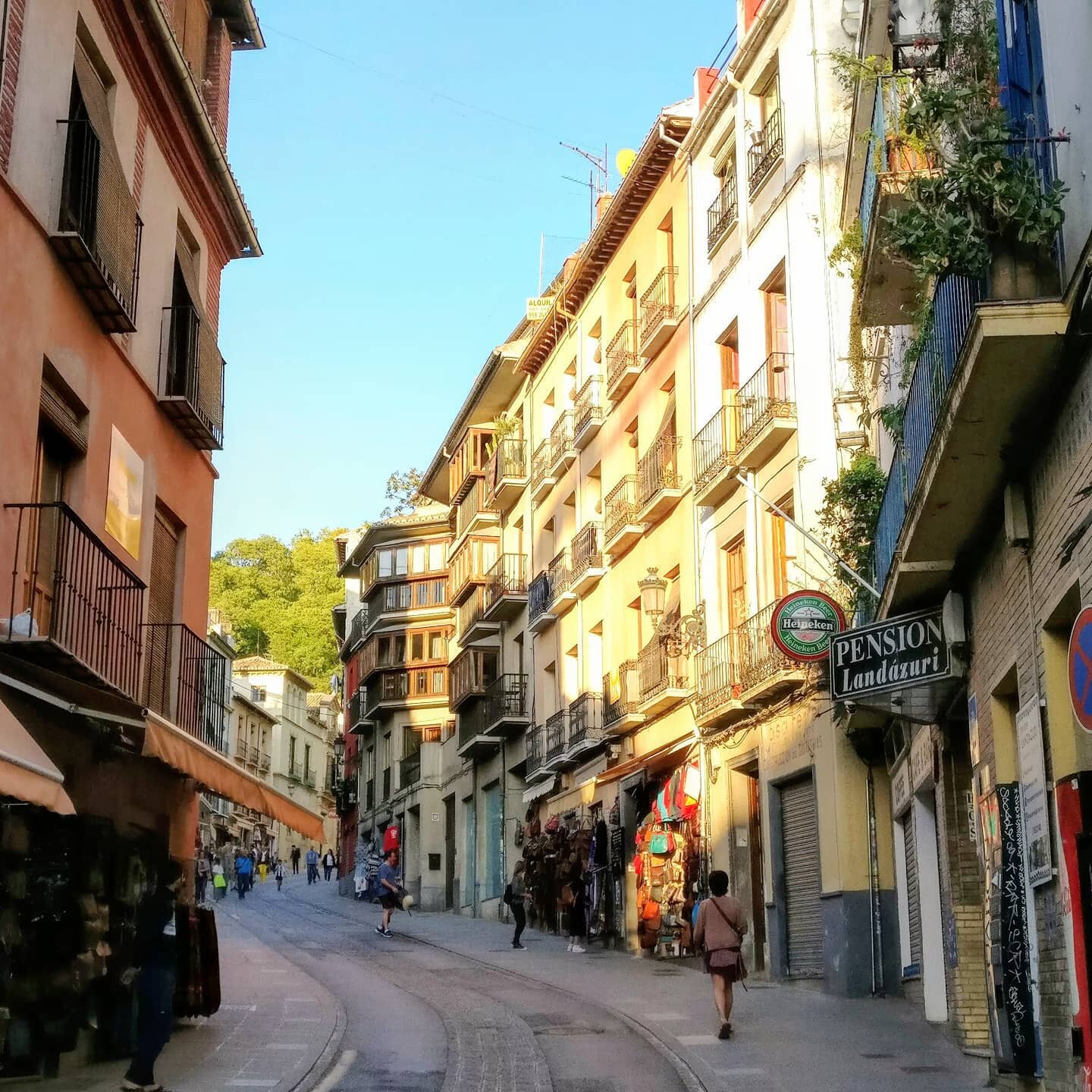 #granada is a hilly city with winding roads. The typical layout of the city has 4 to 5 story #buildings that have shops on the road level and apartments above. This method of #urbanplanning allows for a more #walkablecity and good use of space. This 