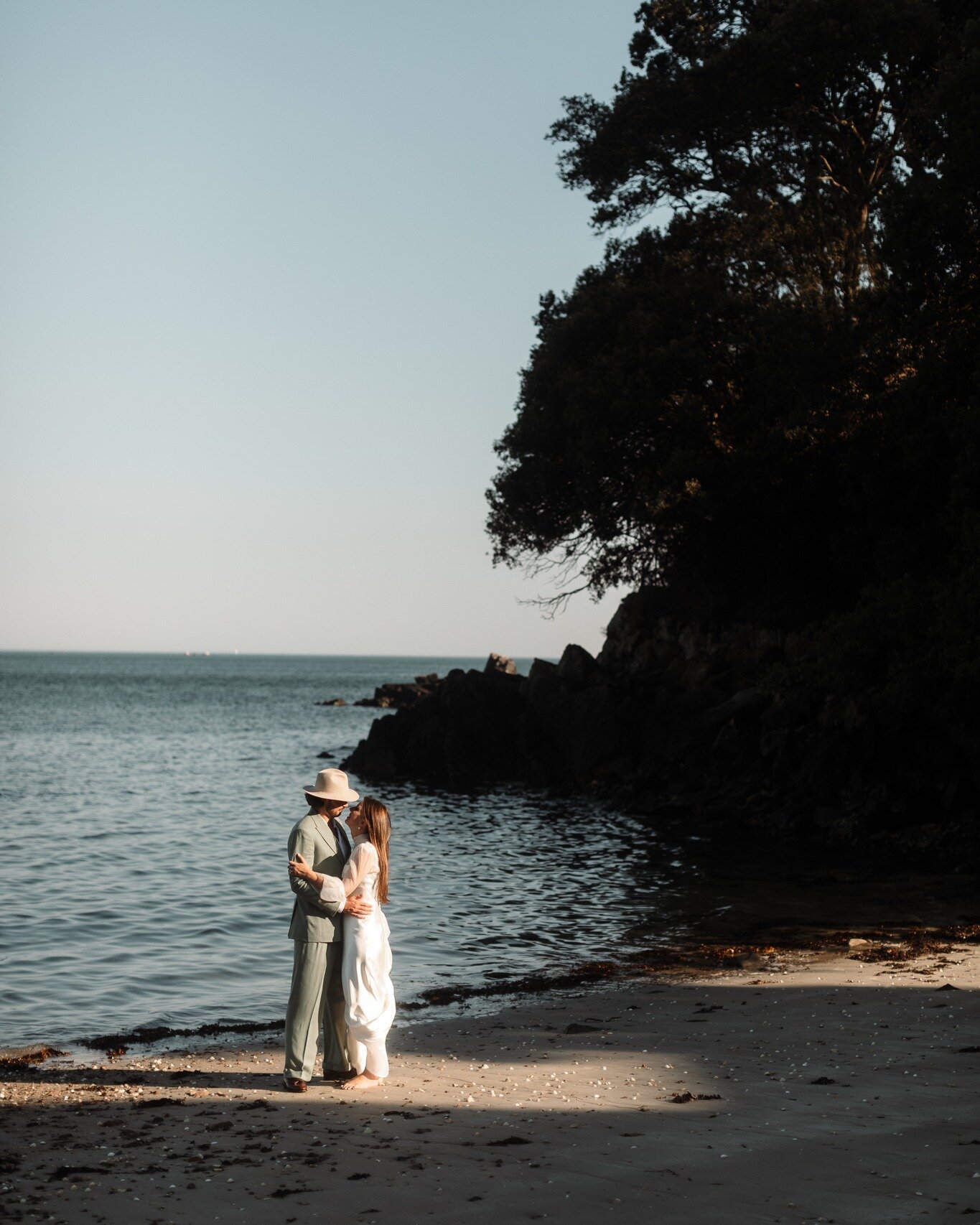 Summer evening beach strolls for these newlyweds - make the most of the private moments on your wedding day when you get chance.