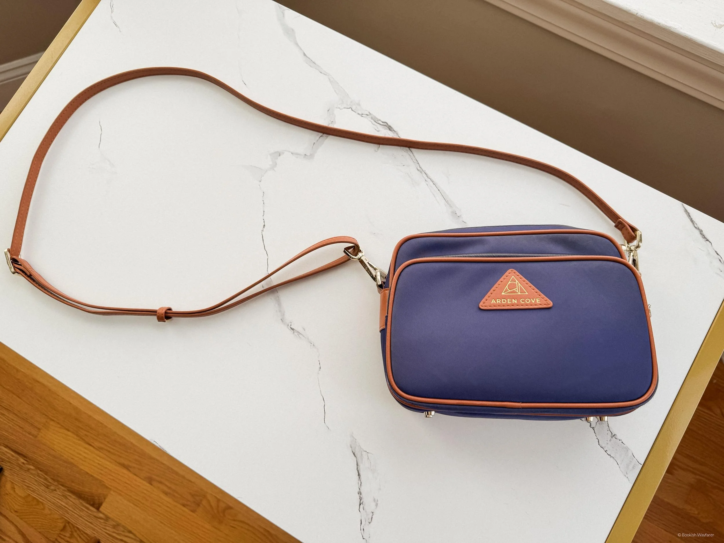 Arden Cove Crissy Full Crossbody purse laid flat atop a white table