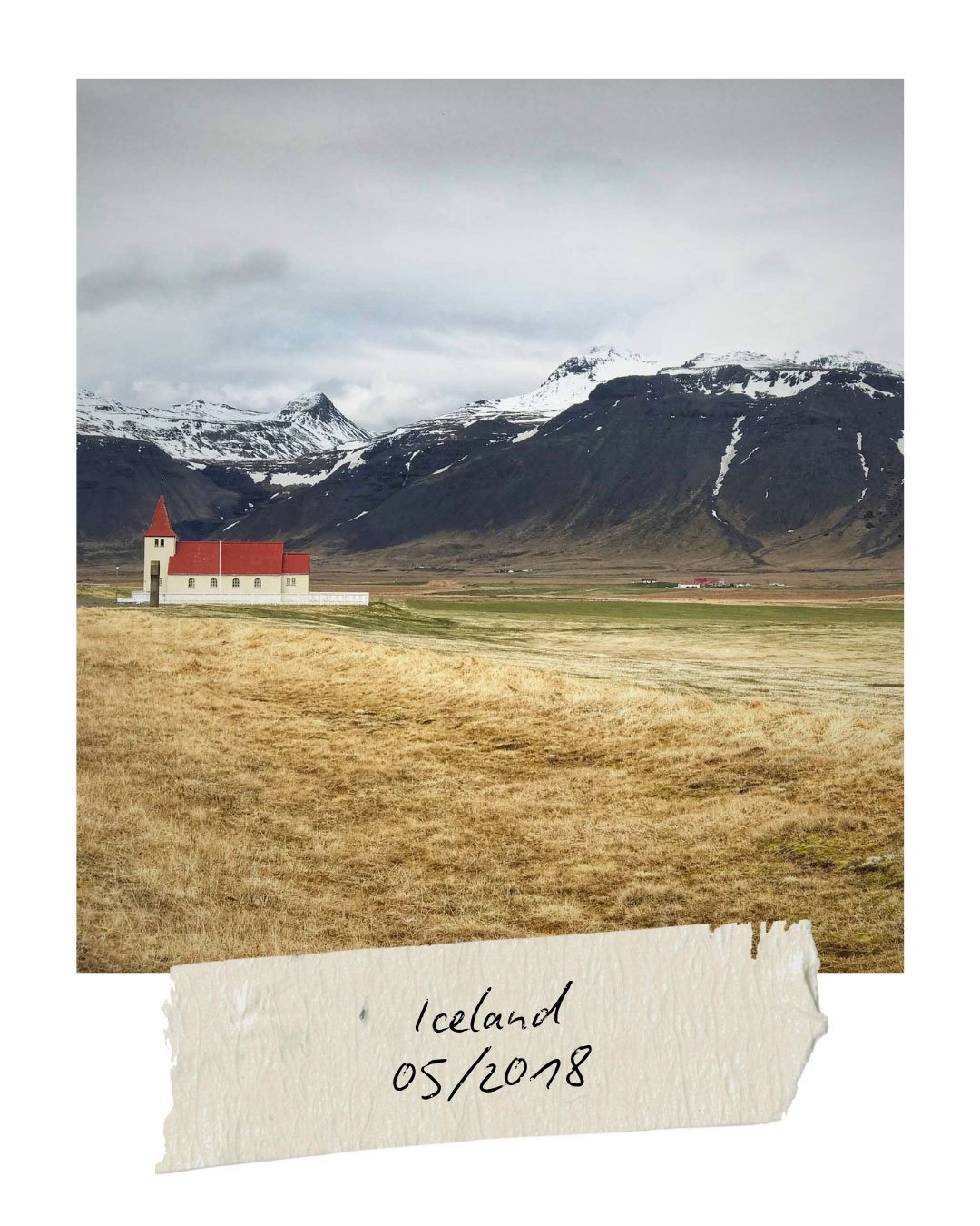 A church in front of mountains in Iceland
