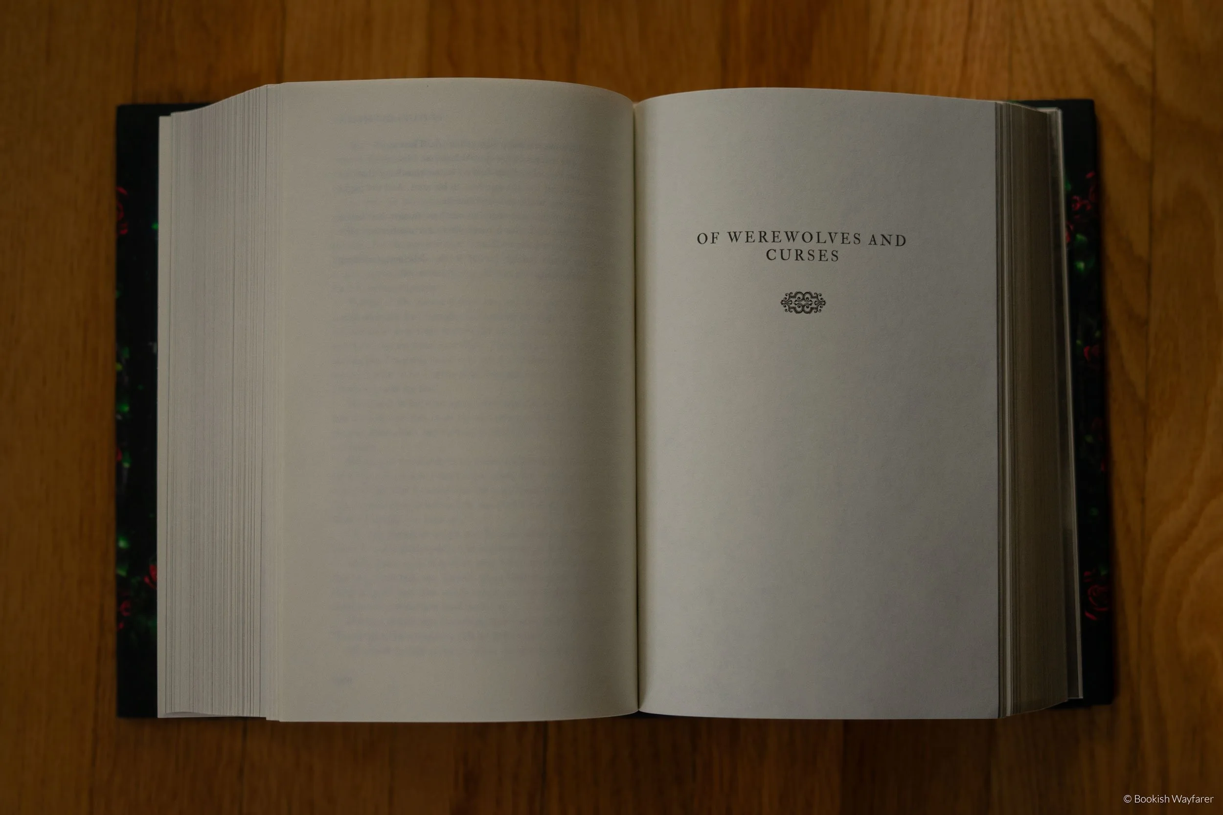 The book Of Werewolves and Curses opened to its title page