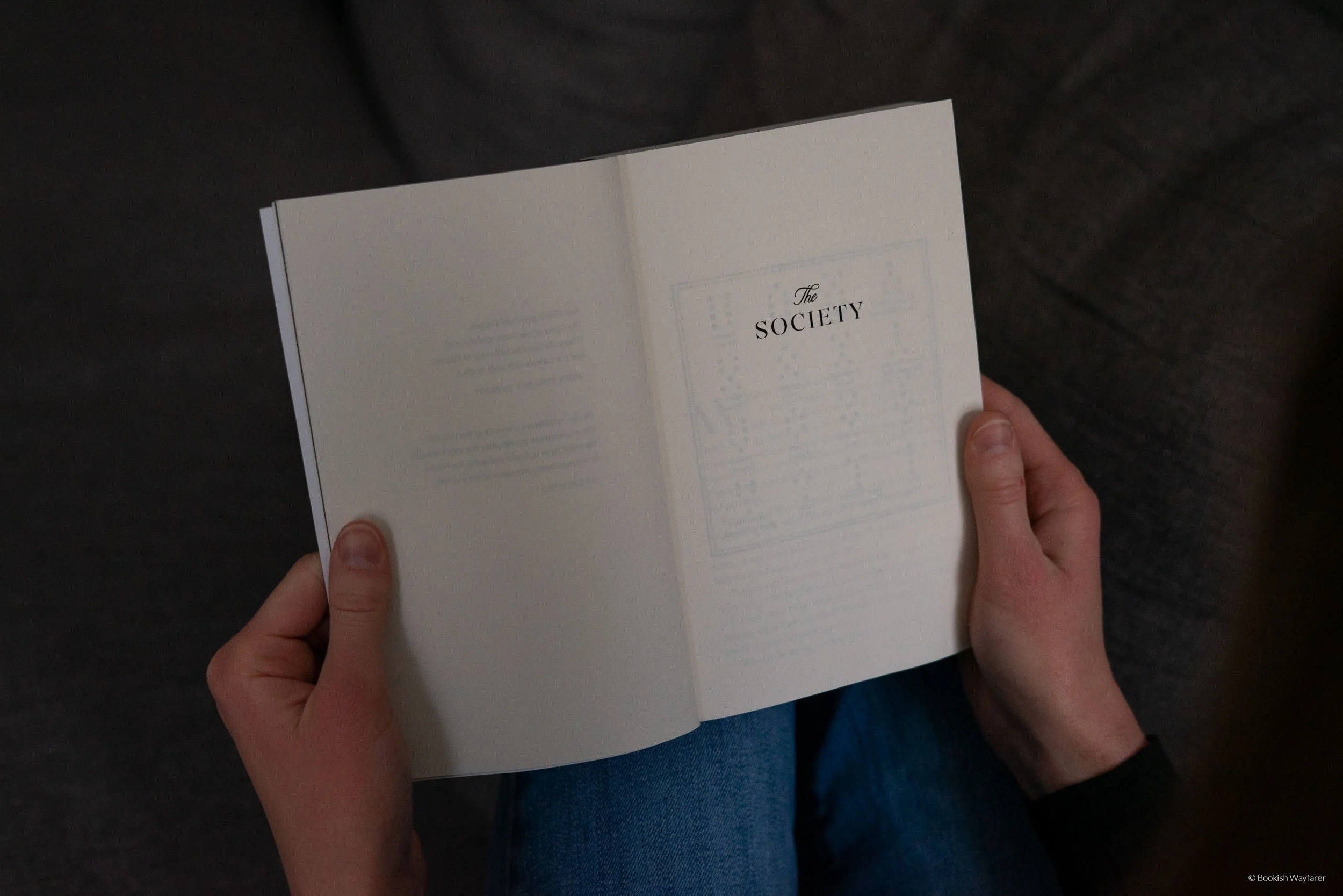 The book The Society opened to its title page