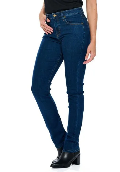 A model wearing Aviator Best Travel Jeans Slim Straight in Classic Indigo