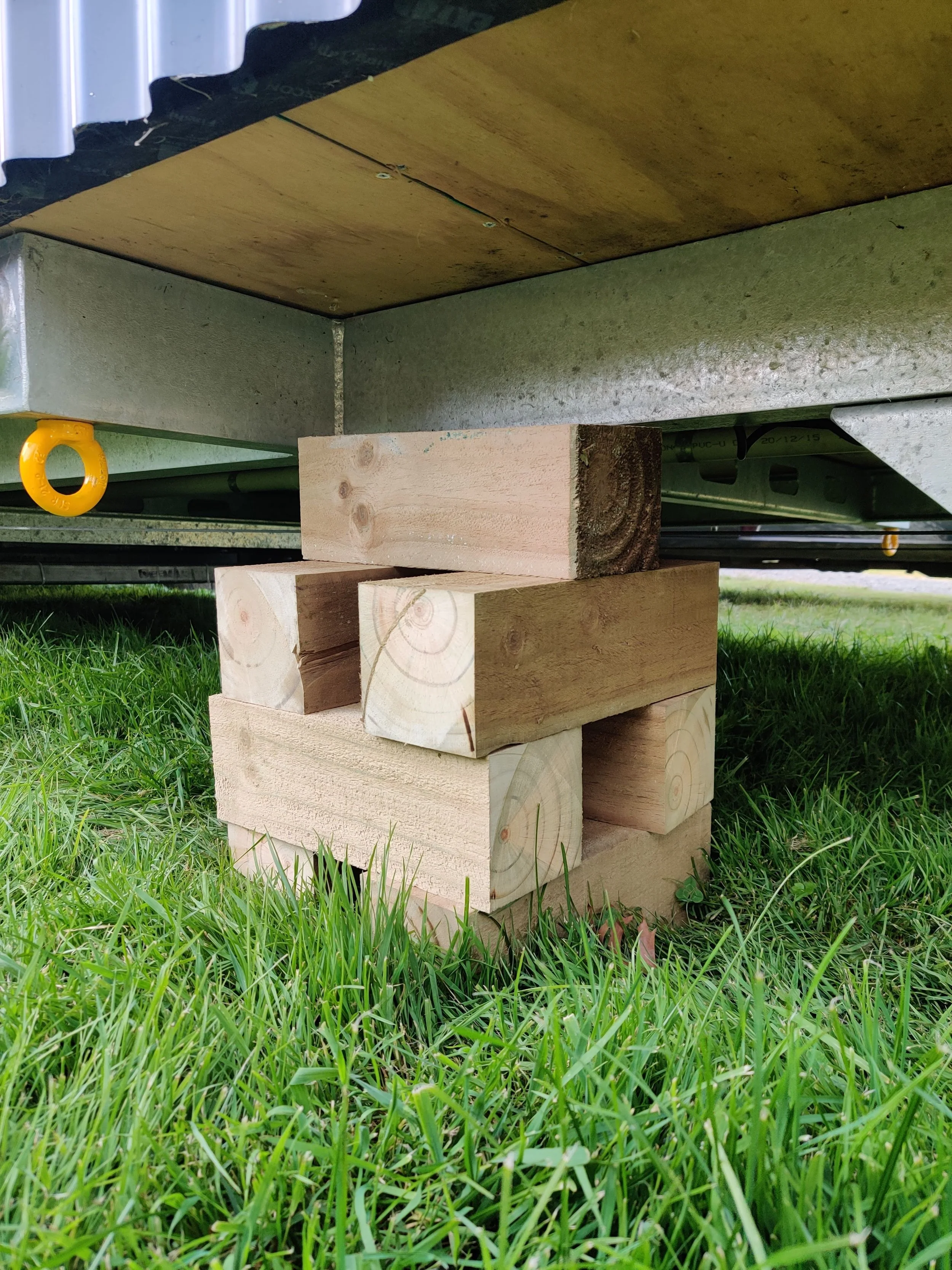 pile of timber blocks to support tiny house