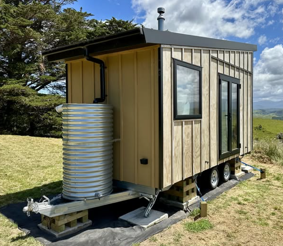 well supported nz tiny house using corner steadies, timber block piles and tie down points