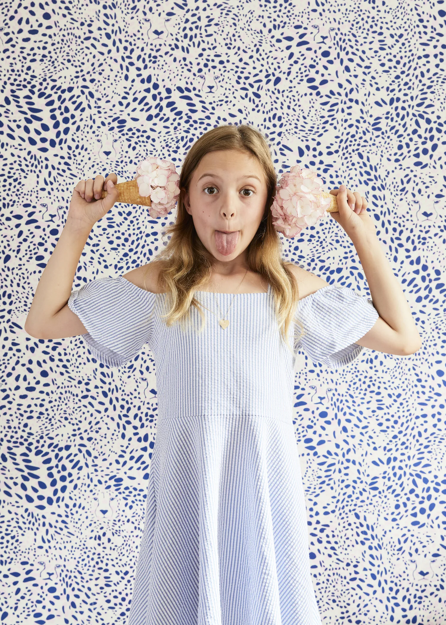 Corinna Fielden art direction and prop styling. Ice cream cone, pink hydrangea, and cheetah wallpaper. Photo by Dylan Chandler.
