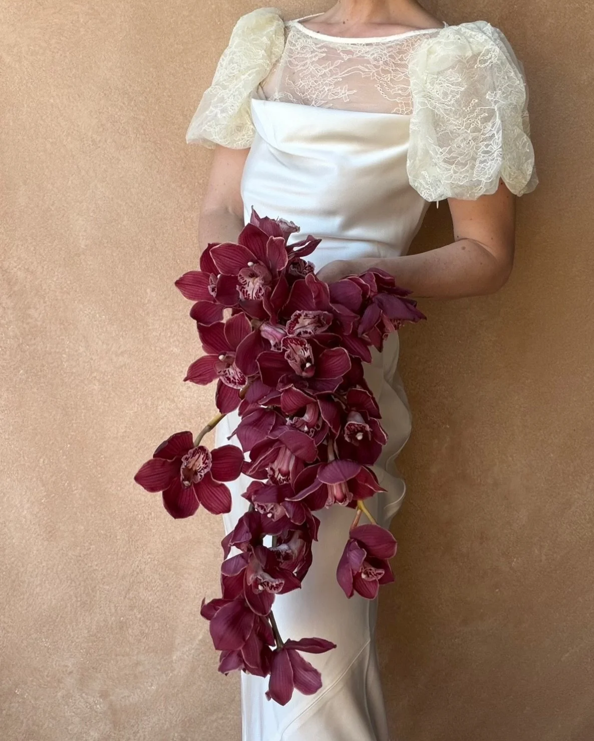 the quiet luxury of a bouquet of cascading orchids 🍇 sometimes less is just so so much more