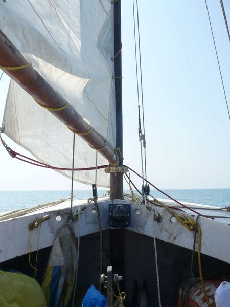 A view from inside. The boat had wooden spars and we used a lot of plastic rope. The port side deck you can see the bamboo sticks that we used as spinnaker poles