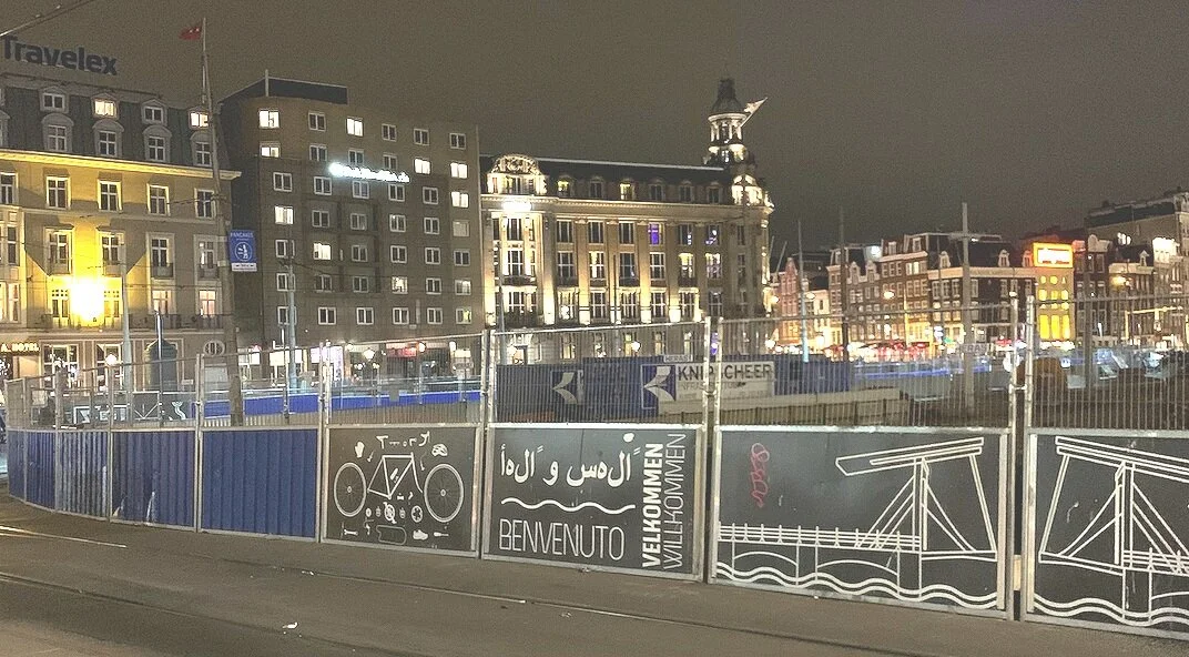 Amsterdam Centraal Station, NL - photo shows Arabic sign: “Welcome” in English, designed in the wrong direction to the language and with disjointed letters.