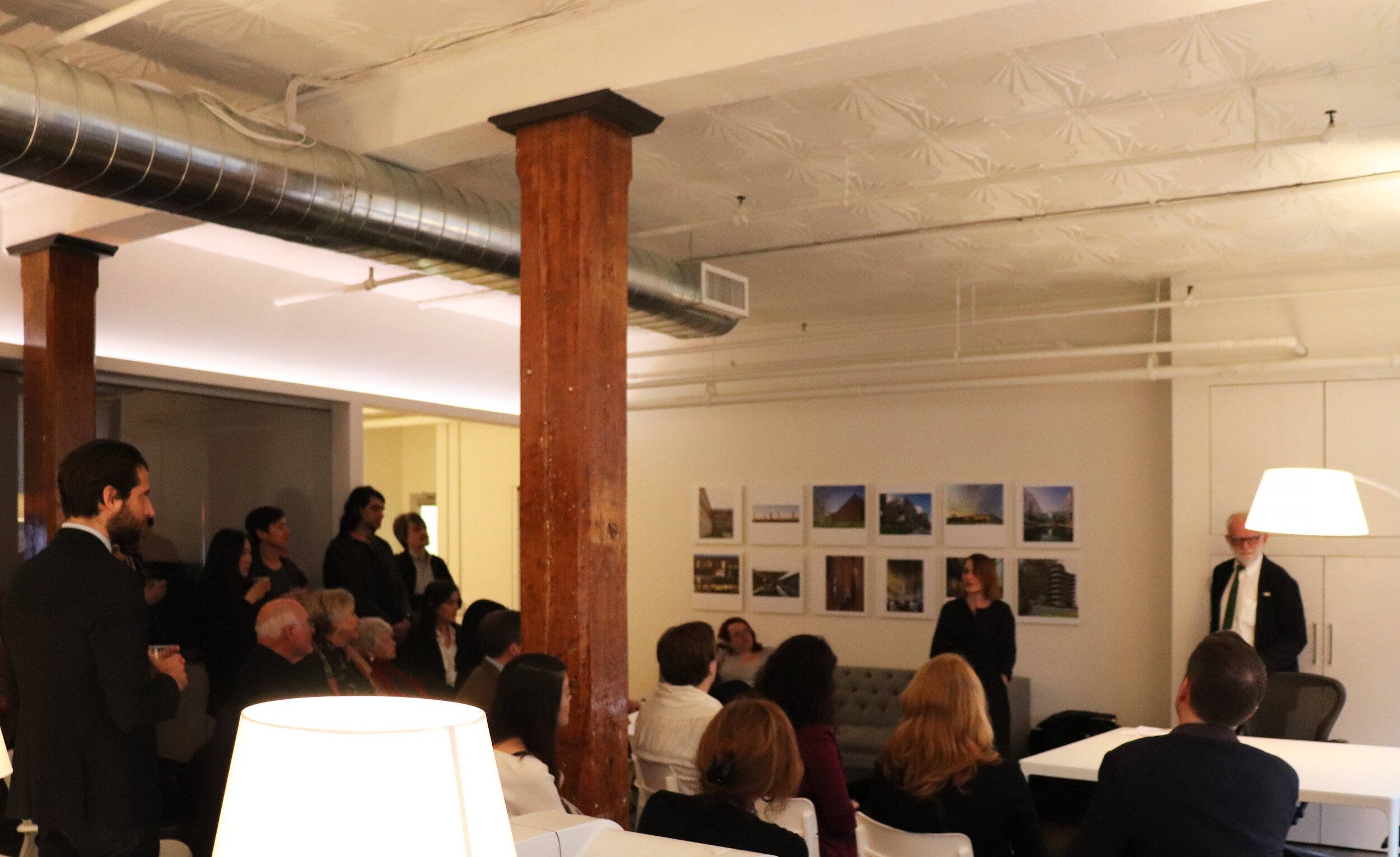 Ozge welcoming the event guests to the studio with Theoharis David FAIA