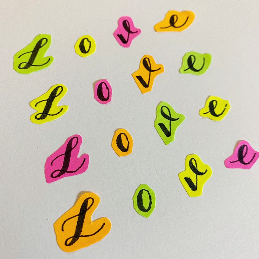 Love in calligraphy on neon post-it notes.jpeg