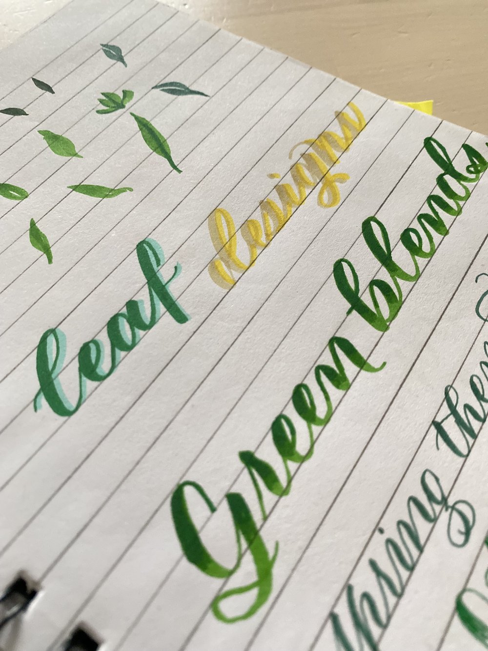 Calligrpahy practice with green blends and shadows.jpeg