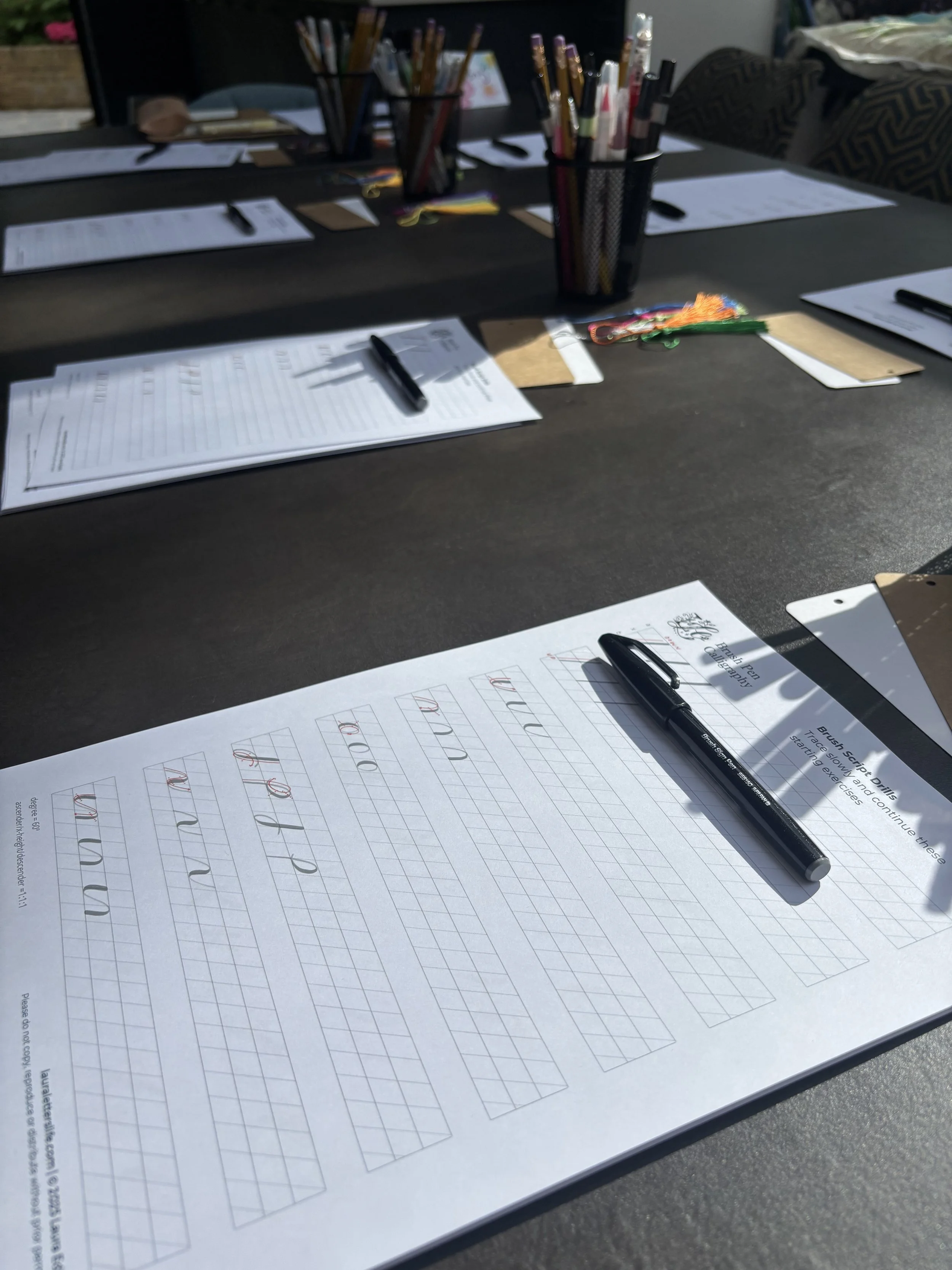 A team workshop set up - ready to learn calligraphy as a group