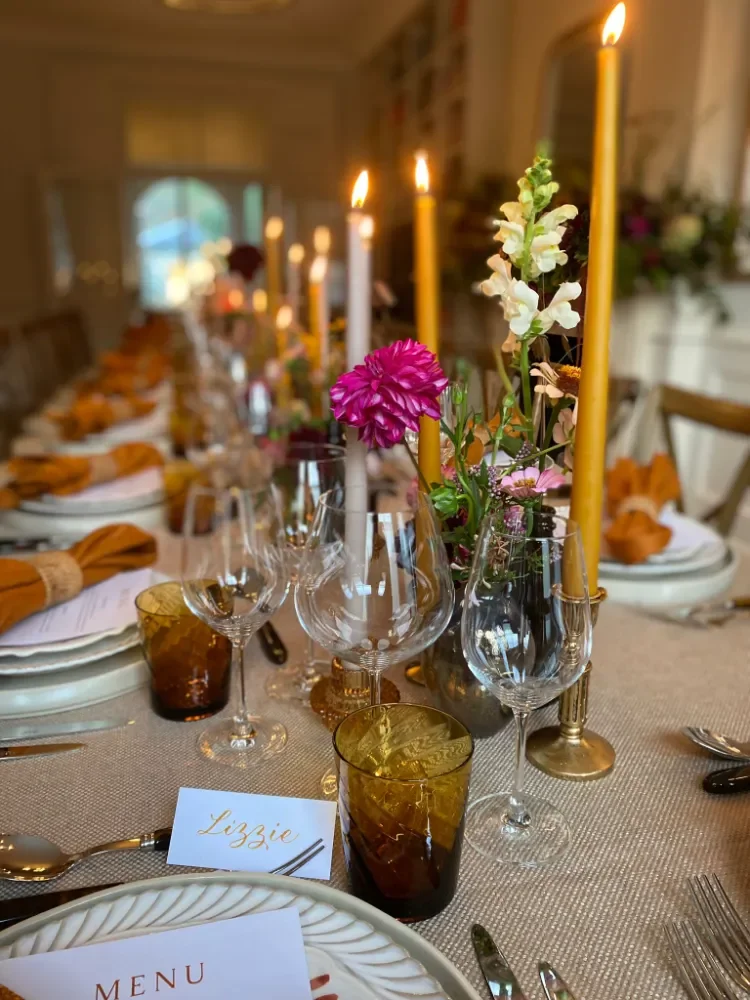 A dressed dining table with calligraphy name placeholders